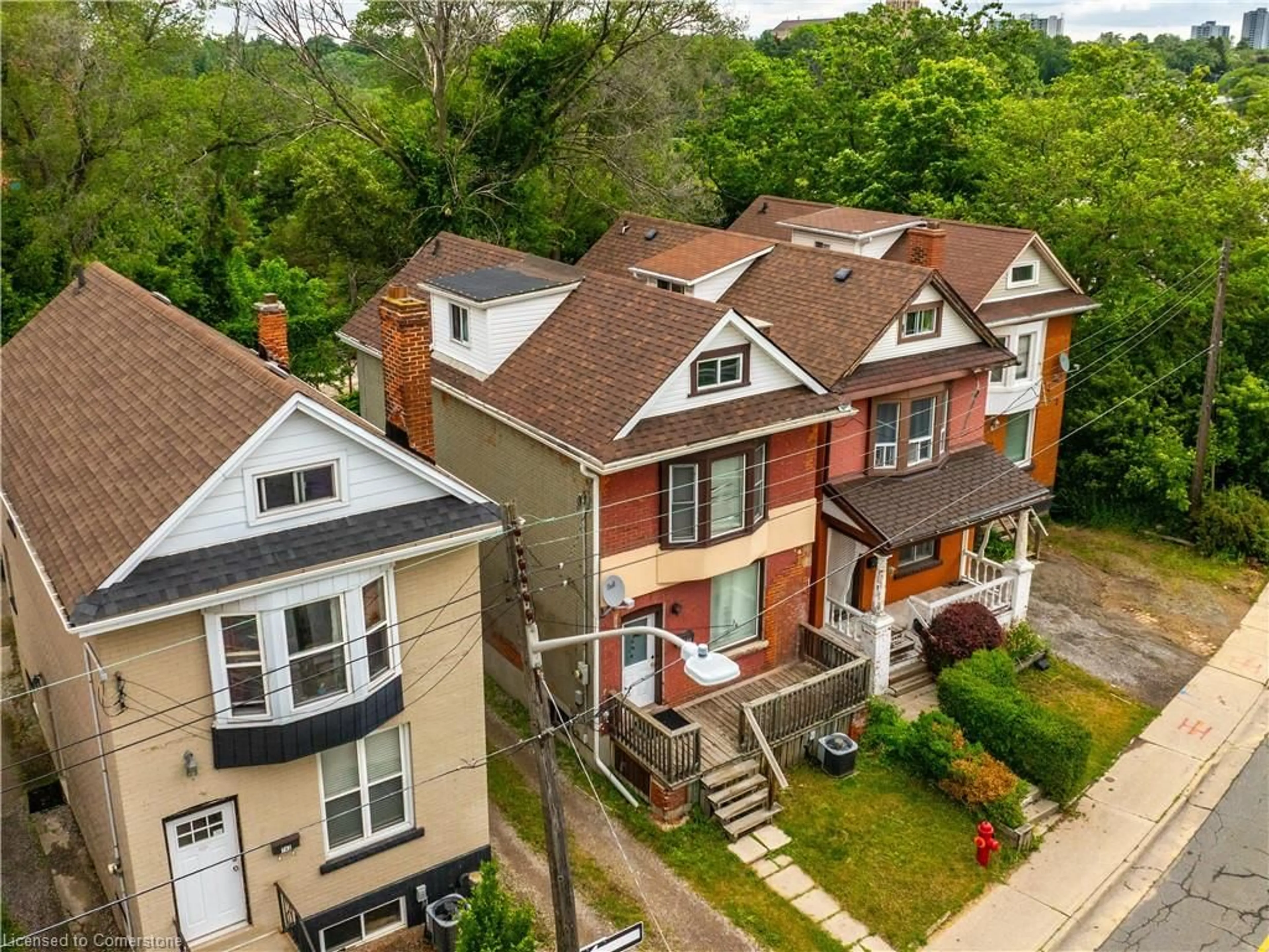 A pic from outside/outdoor area/front of a property/back of a property/a pic from drone, street for 738 King St, Hamilton Ontario L8S 1J8