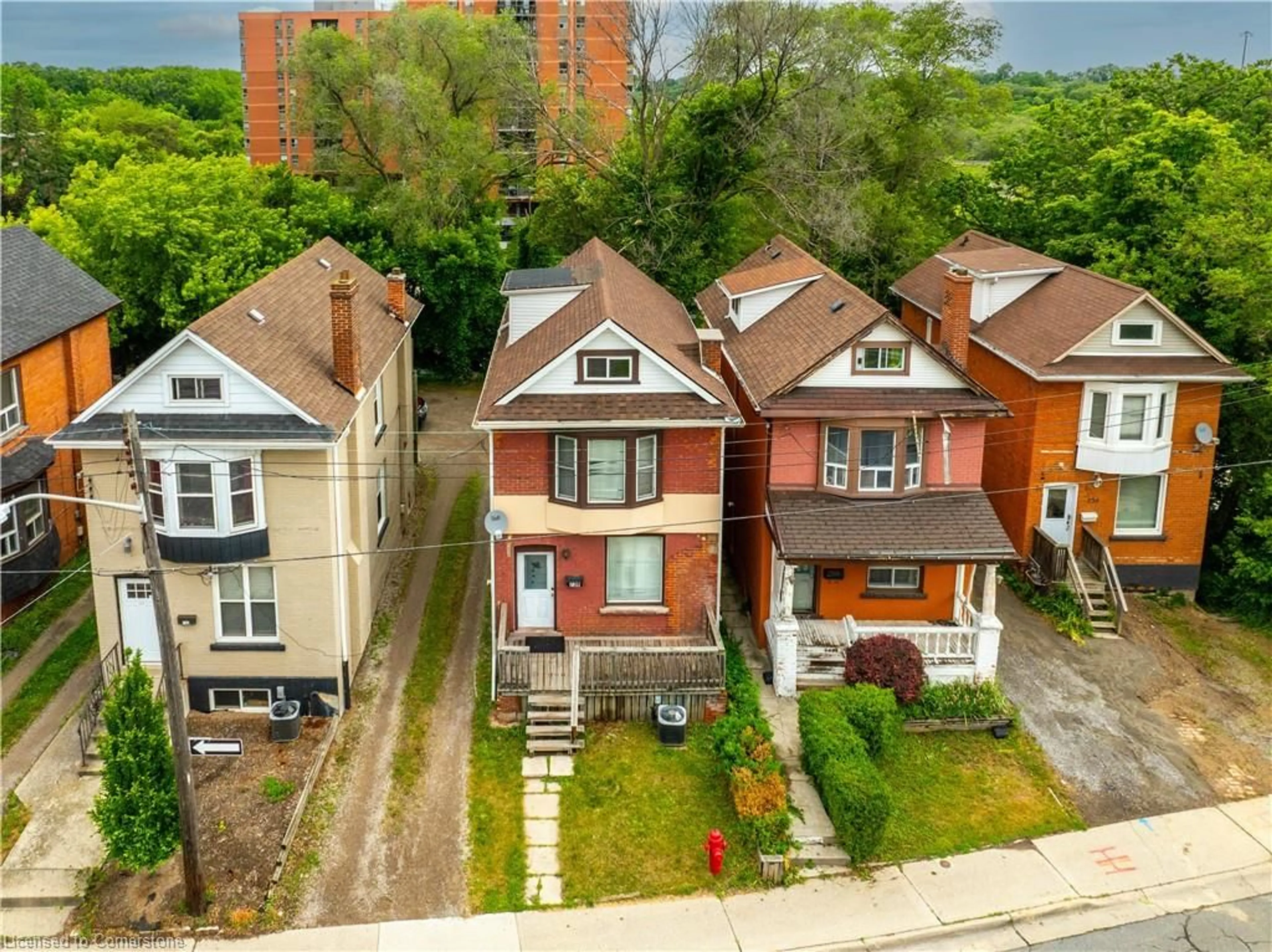 A pic from outside/outdoor area/front of a property/back of a property/a pic from drone, street for 738 King St, Hamilton Ontario L8S 1J8