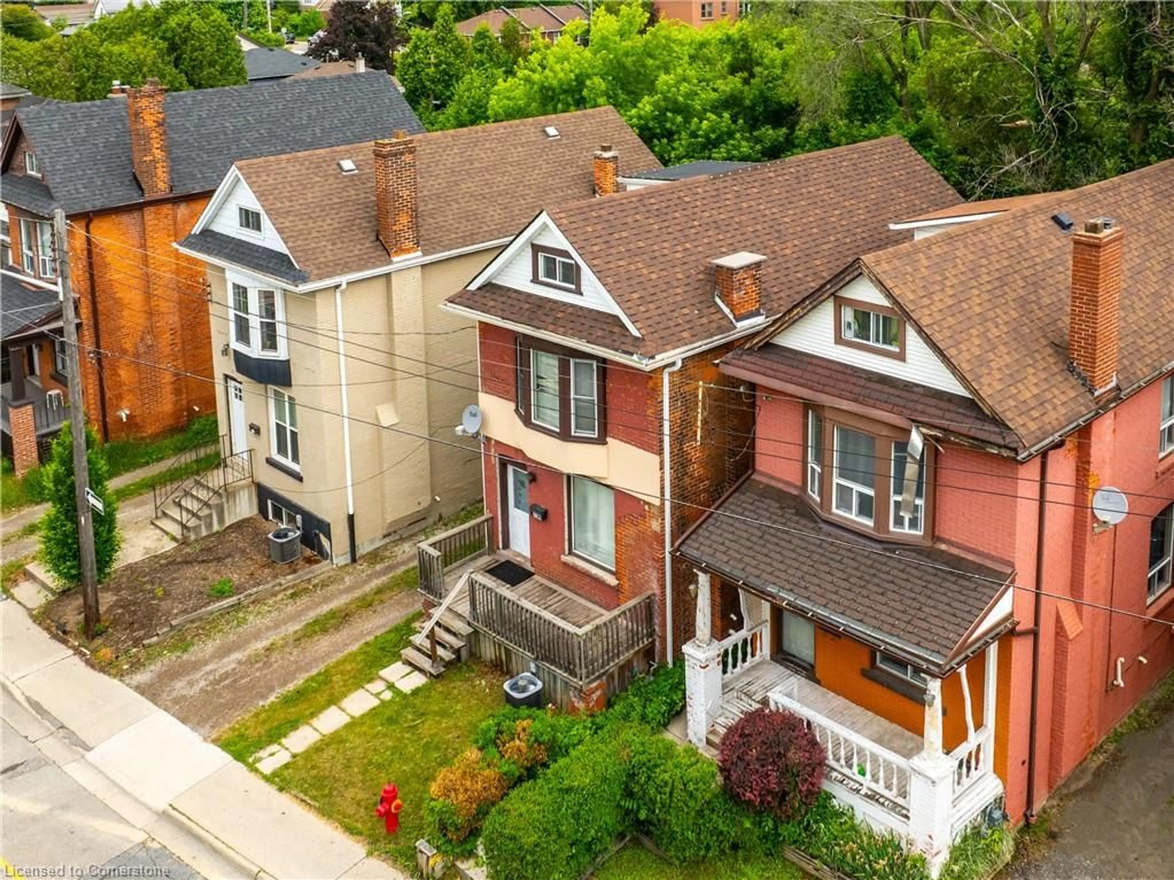 A pic from outside/outdoor area/front of a property/back of a property/a pic from drone, street for 738 King St, Hamilton Ontario L8S 1J8