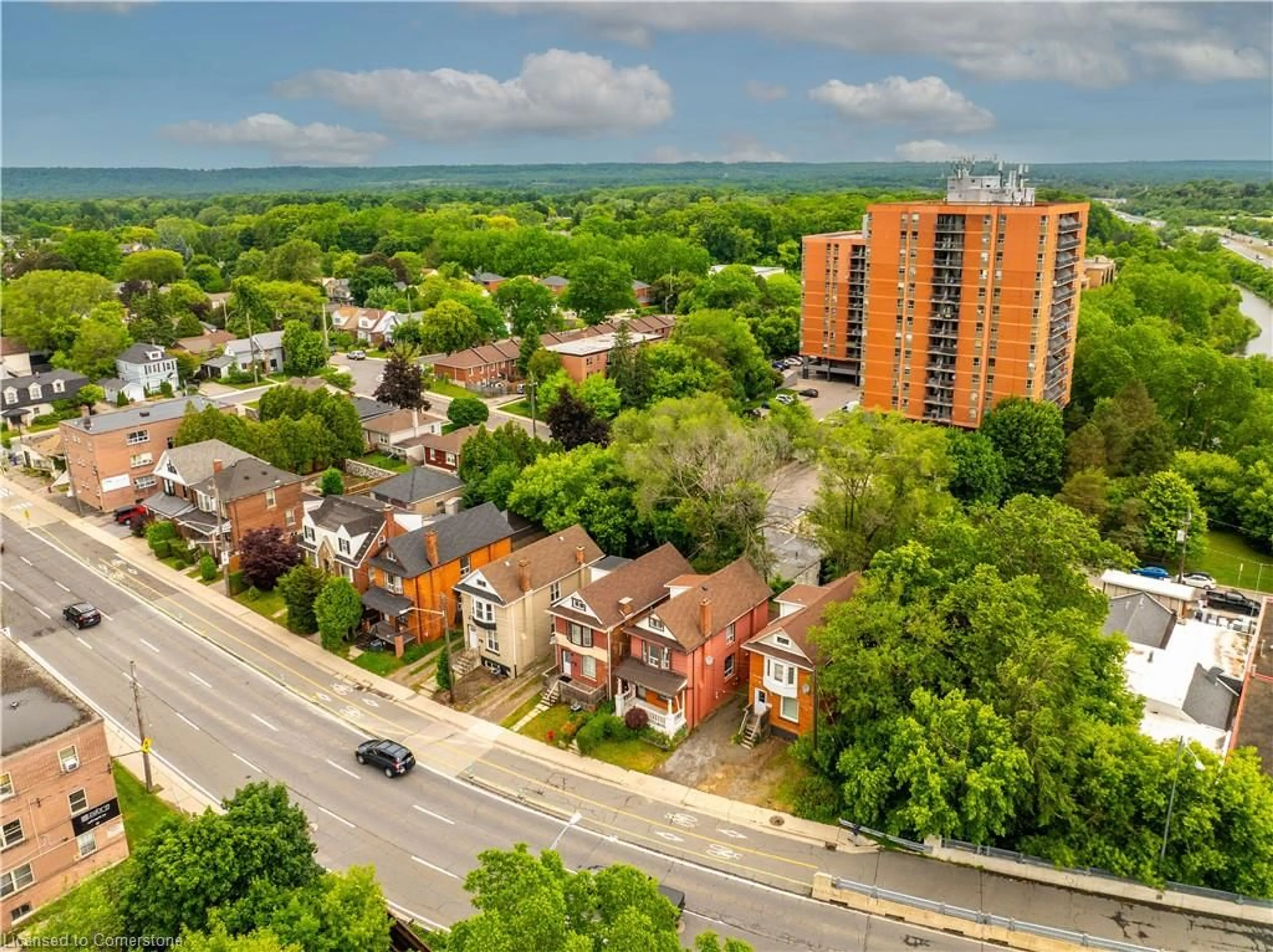 A pic from outside/outdoor area/front of a property/back of a property/a pic from drone, unknown for 738 King St, Hamilton Ontario L8S 1J8