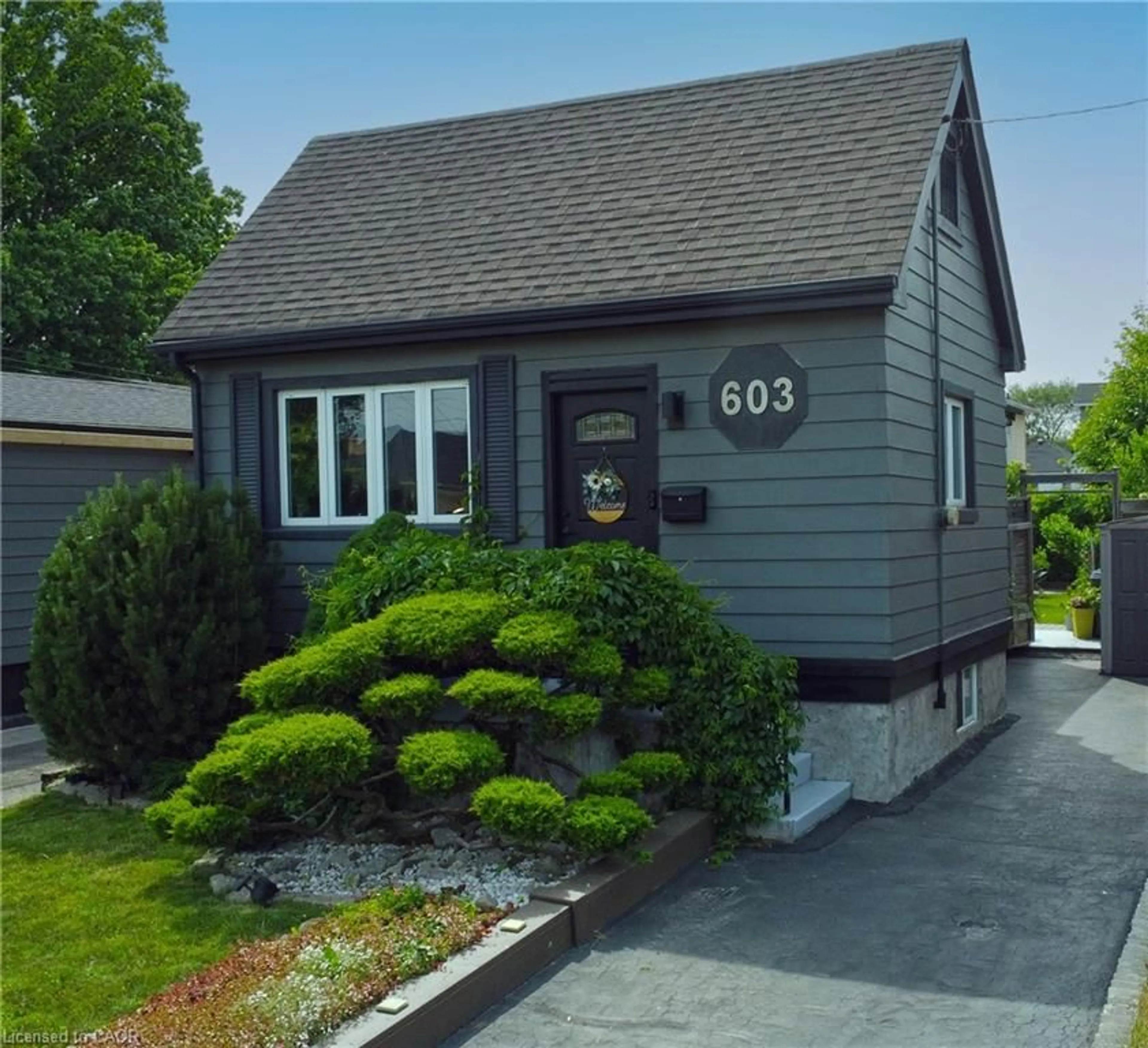 Home with vinyl exterior material, street for 603 Waterloo St, Hamilton Ontario L8H 6V6