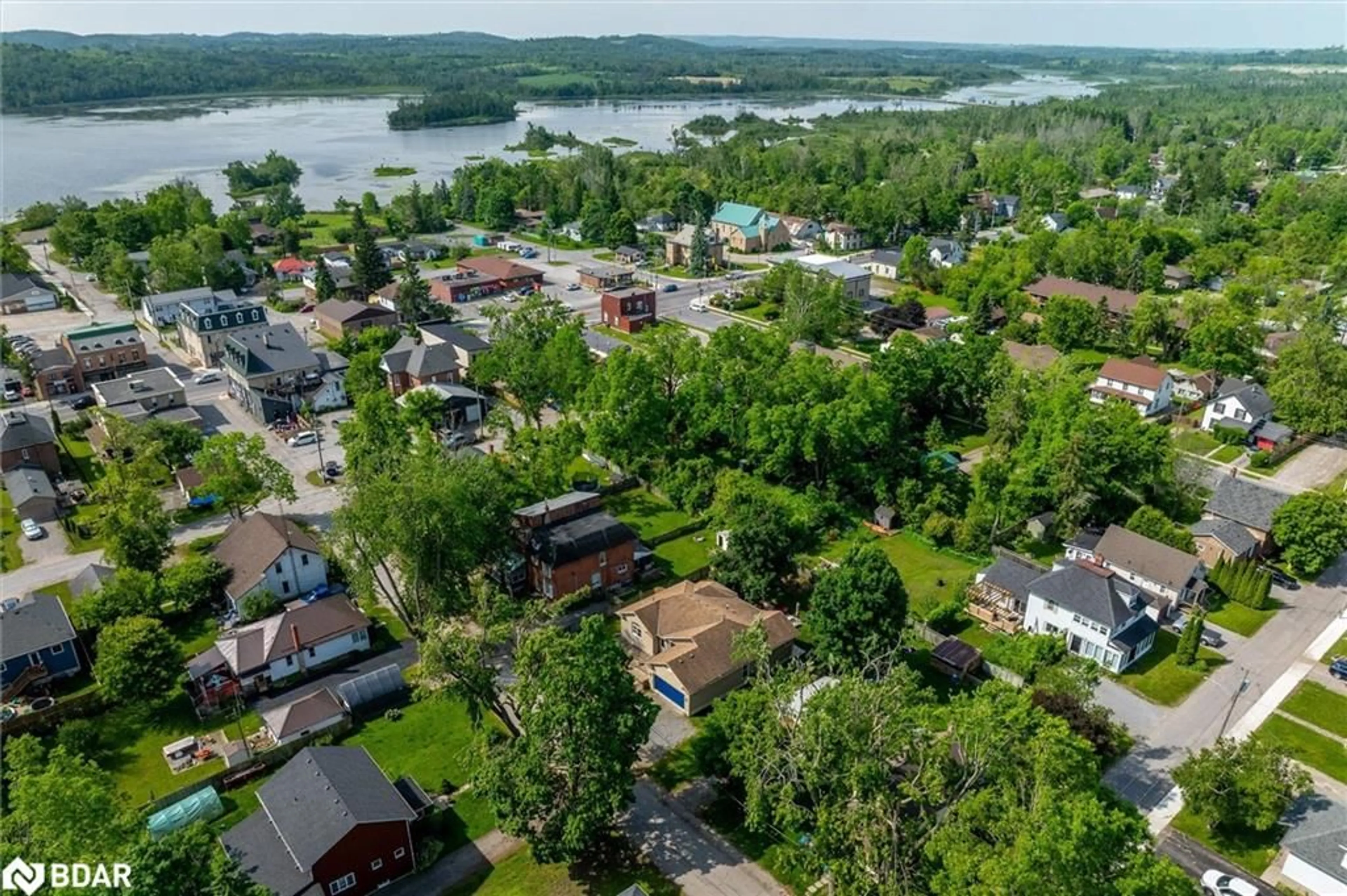 A pic from outside/outdoor area/front of a property/back of a property/a pic from drone, water/lake/river/ocean view for 19 George St, Omemee Ontario K0L 2W0