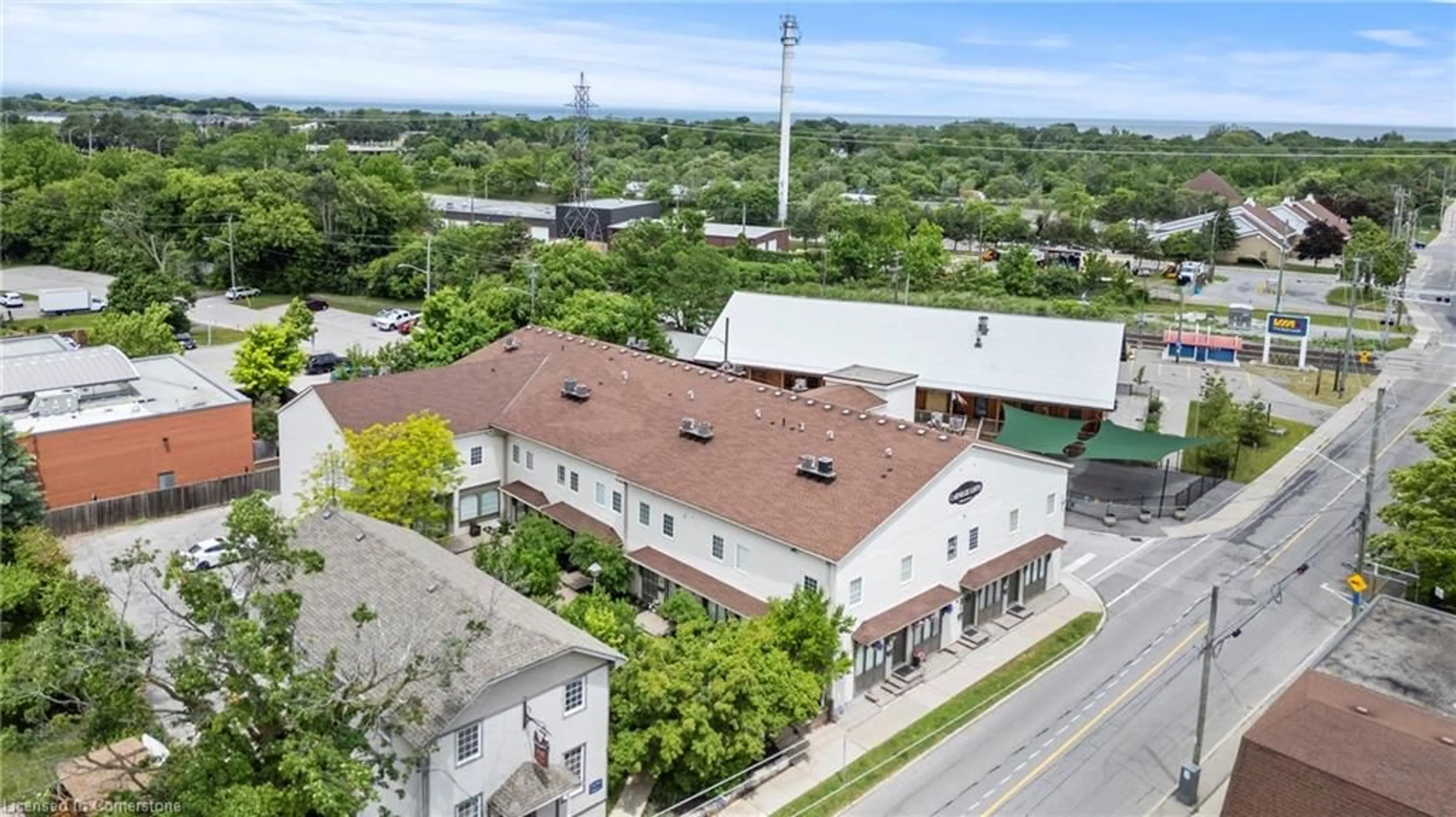 A pic from outside/outdoor area/front of a property/back of a property/a pic from drone, building for 49 Ontario St #1, Grimsby Ontario L3M 3H2