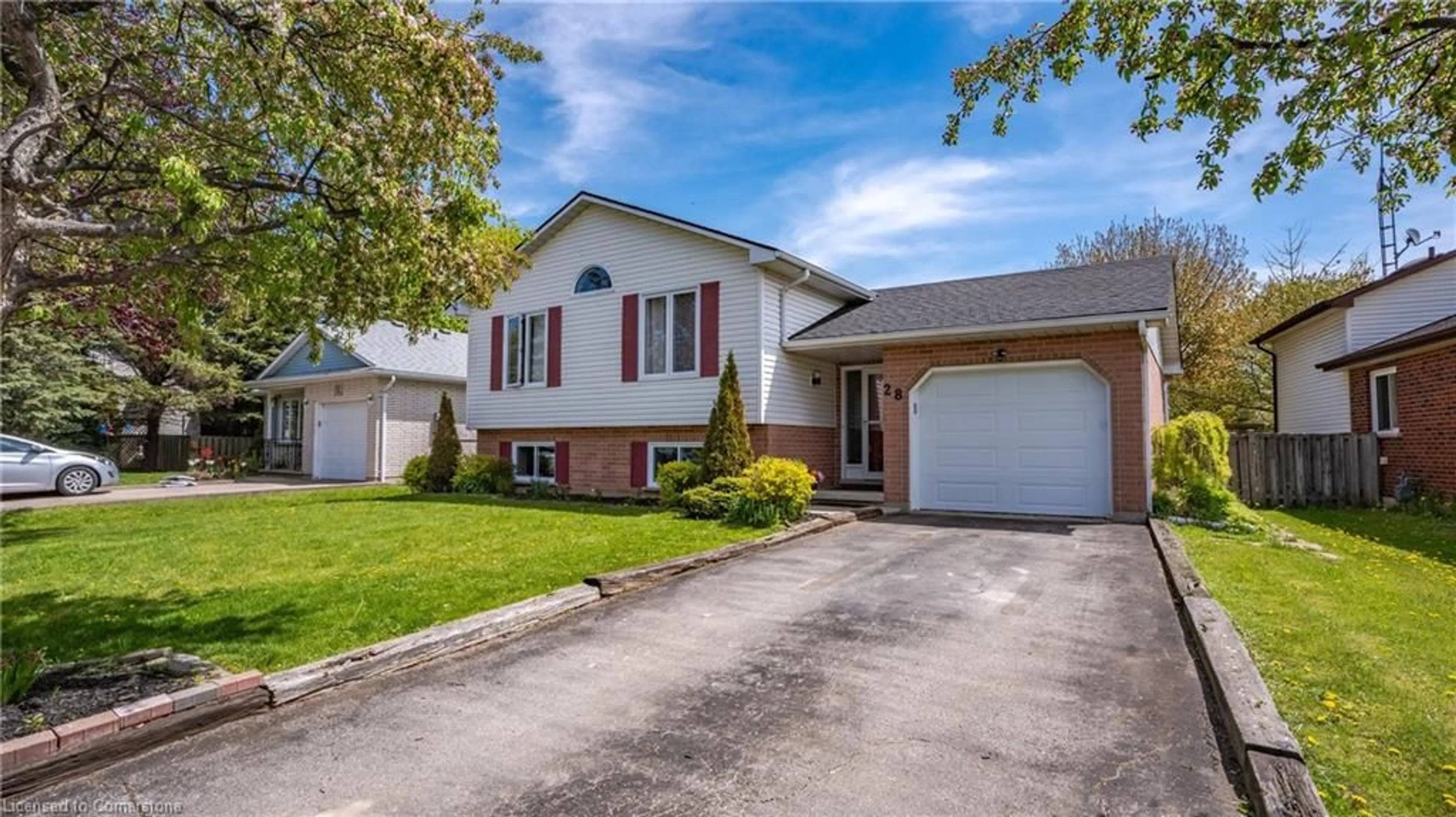 Home with vinyl exterior material, street for 28 Thompson Dr, Port Dover Ontario N0A 1N4