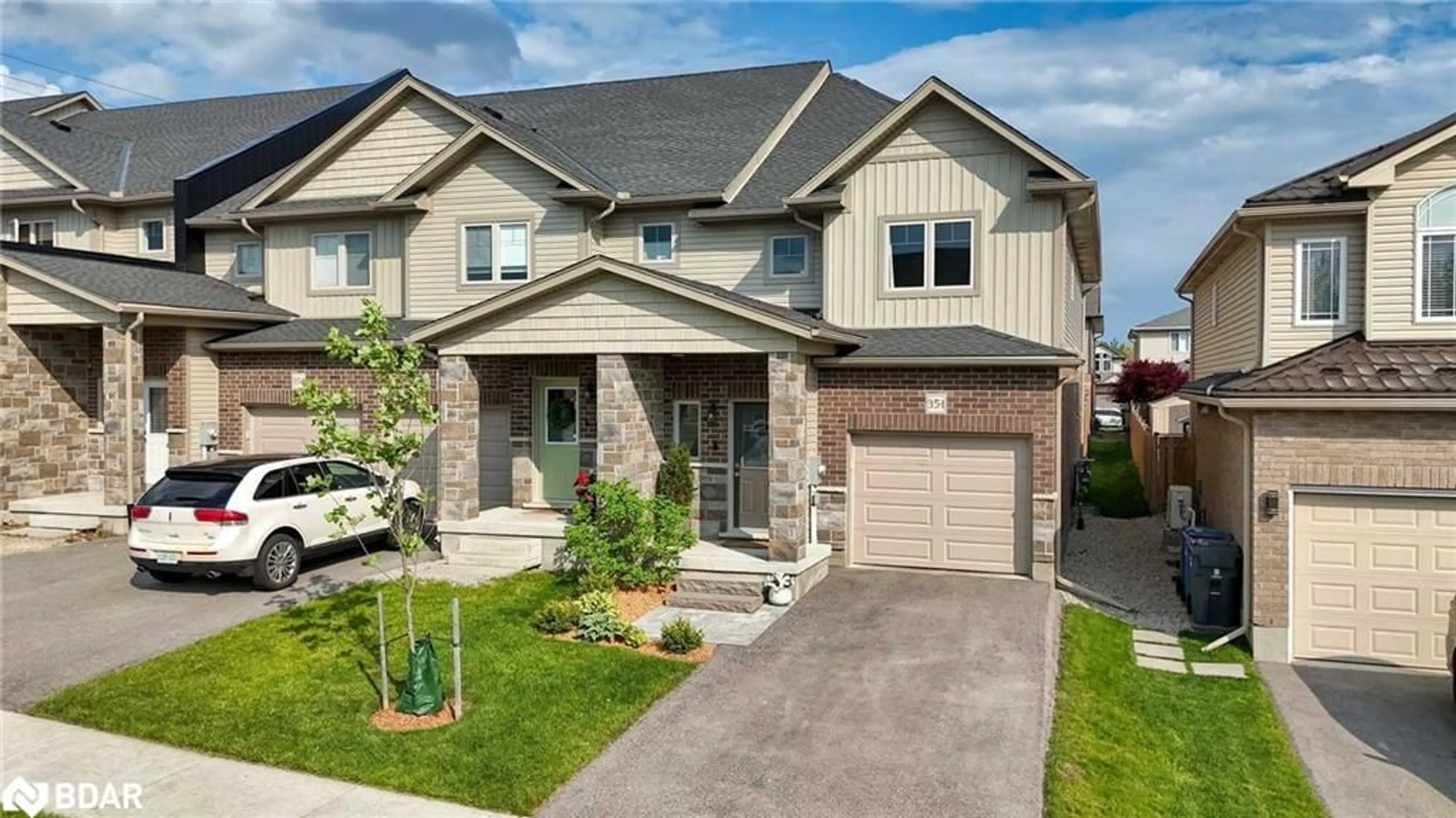 Home with brick exterior material, street for 35 Wideman Blvd #1, Guelph Ontario N1E 7L8