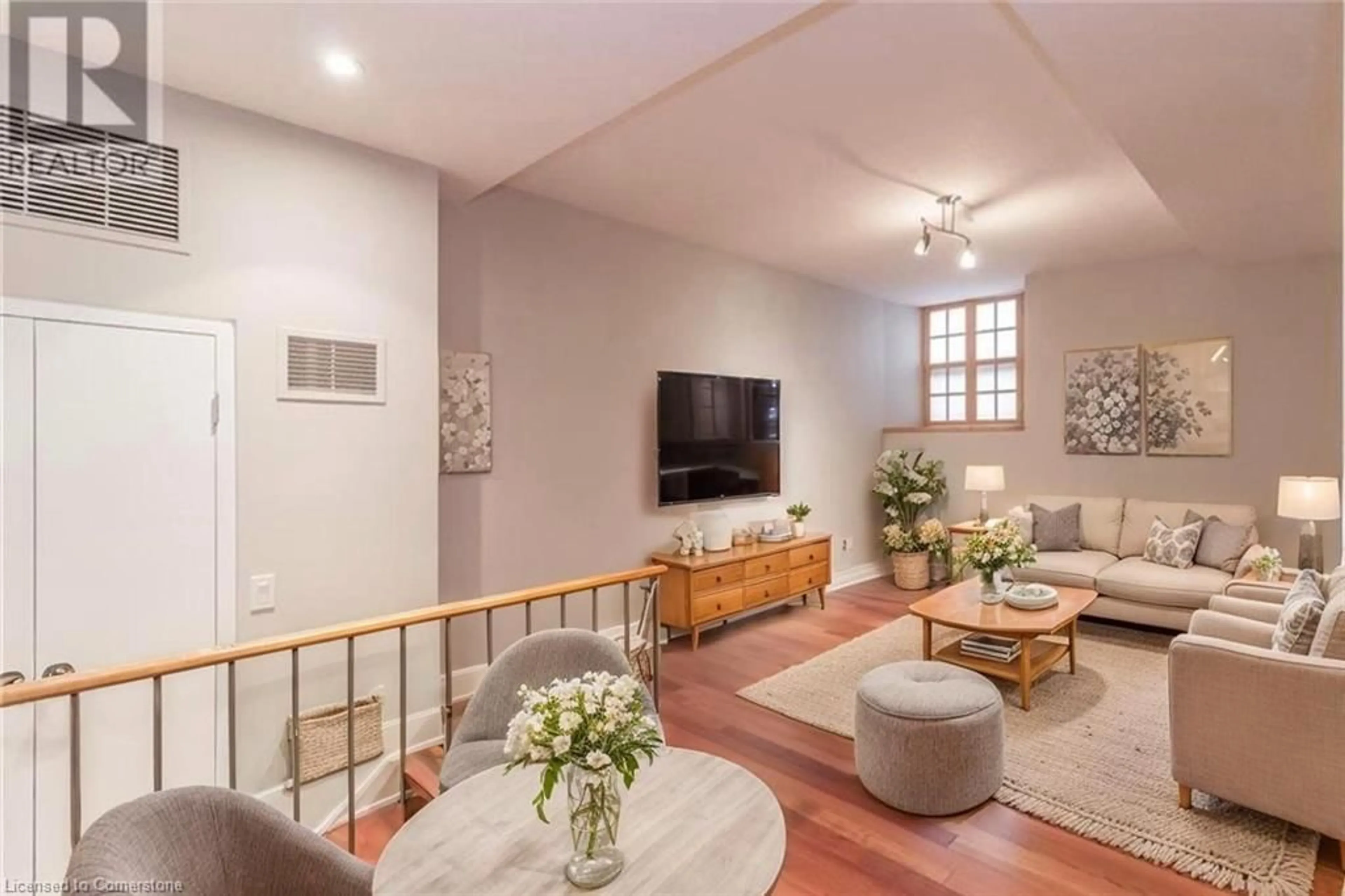 Living room with furniture, unknown for 35 Alexandra Ave #103, Waterloo Ontario N2L 1L4