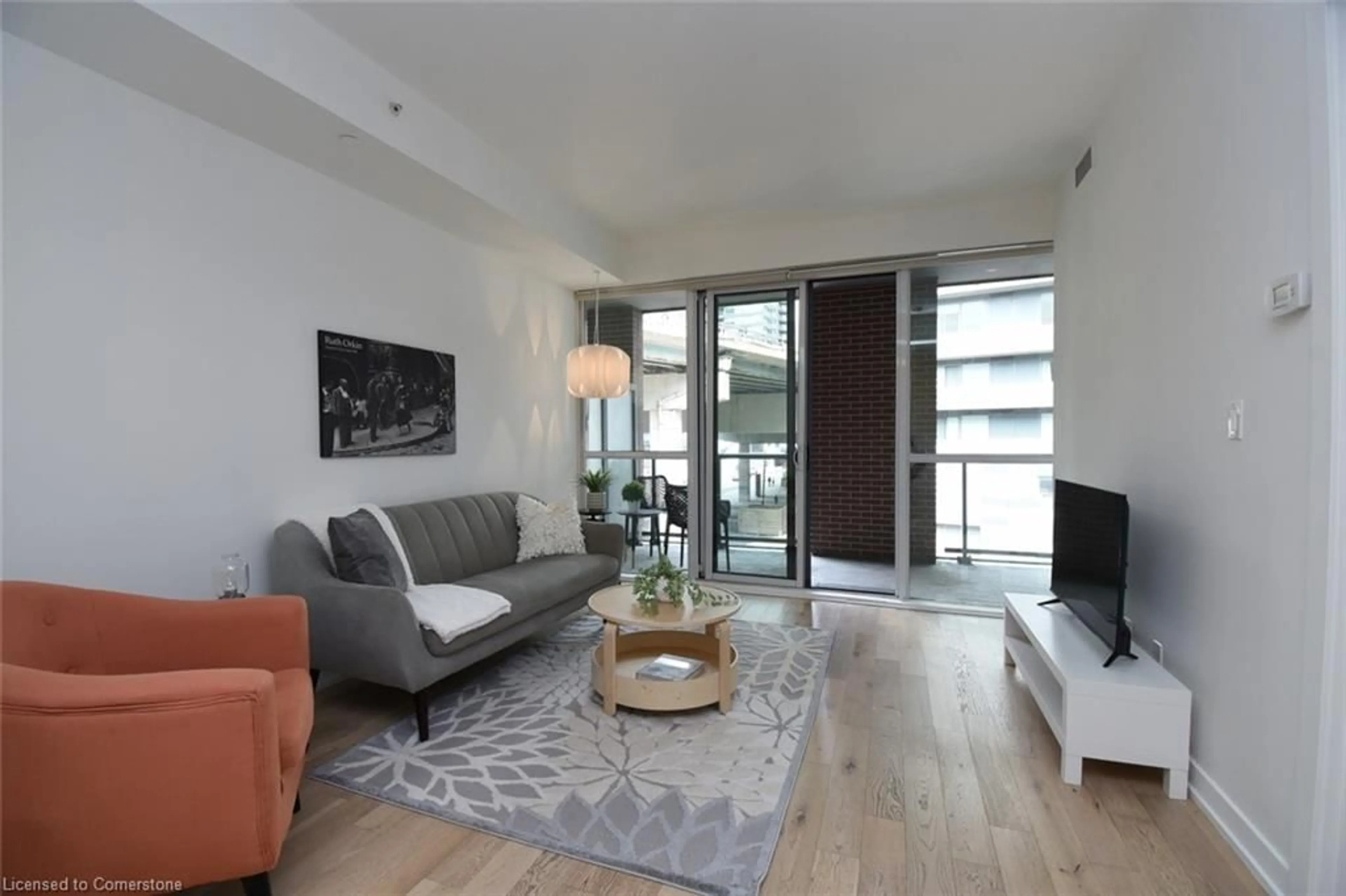 Living room with furniture, unknown for 20 Bruyeres Mews #330, Toronto Ontario M5V 0G8