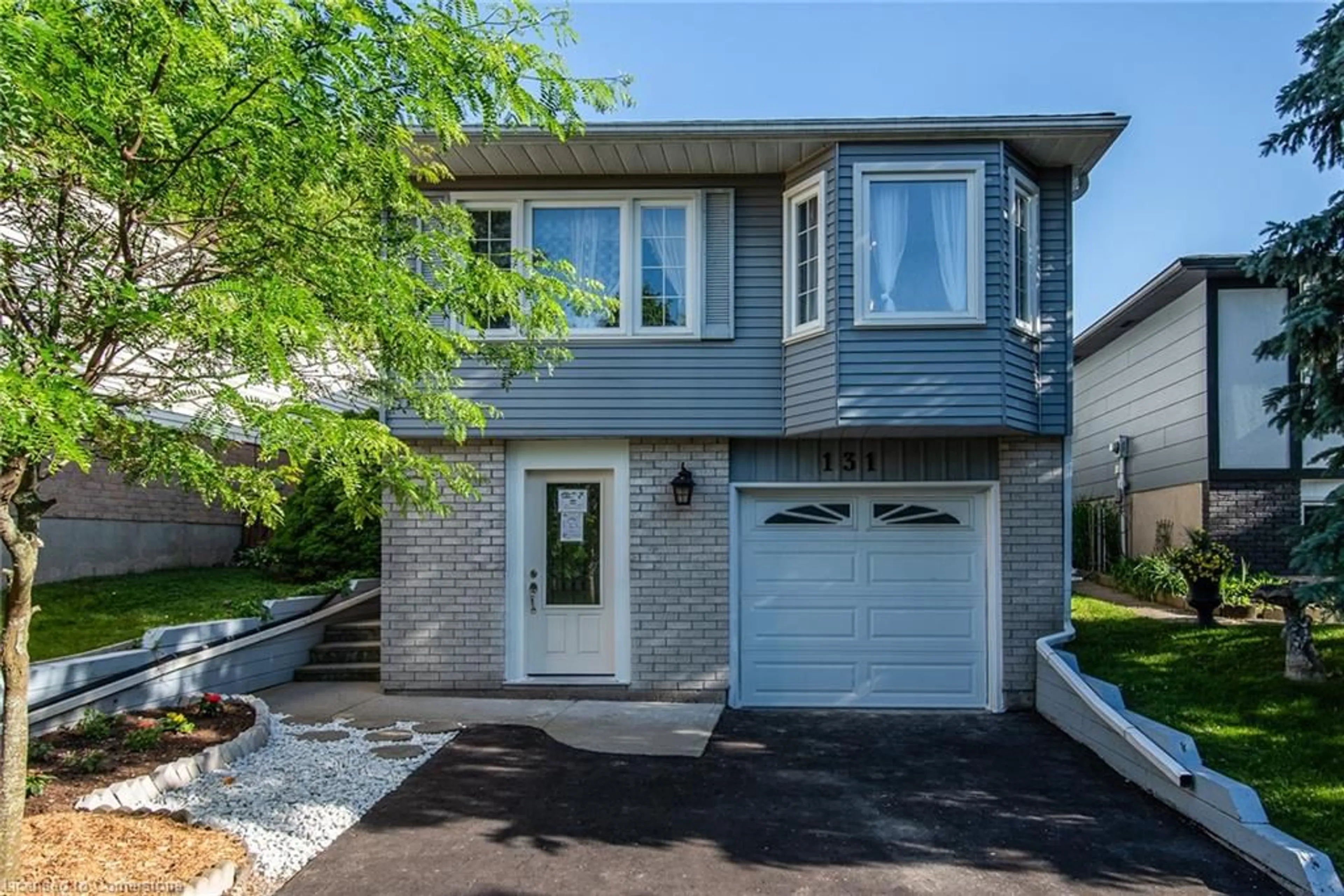 Home with vinyl exterior material, street for 131 Herron Pl, Waterloo Ontario N2T 1H2