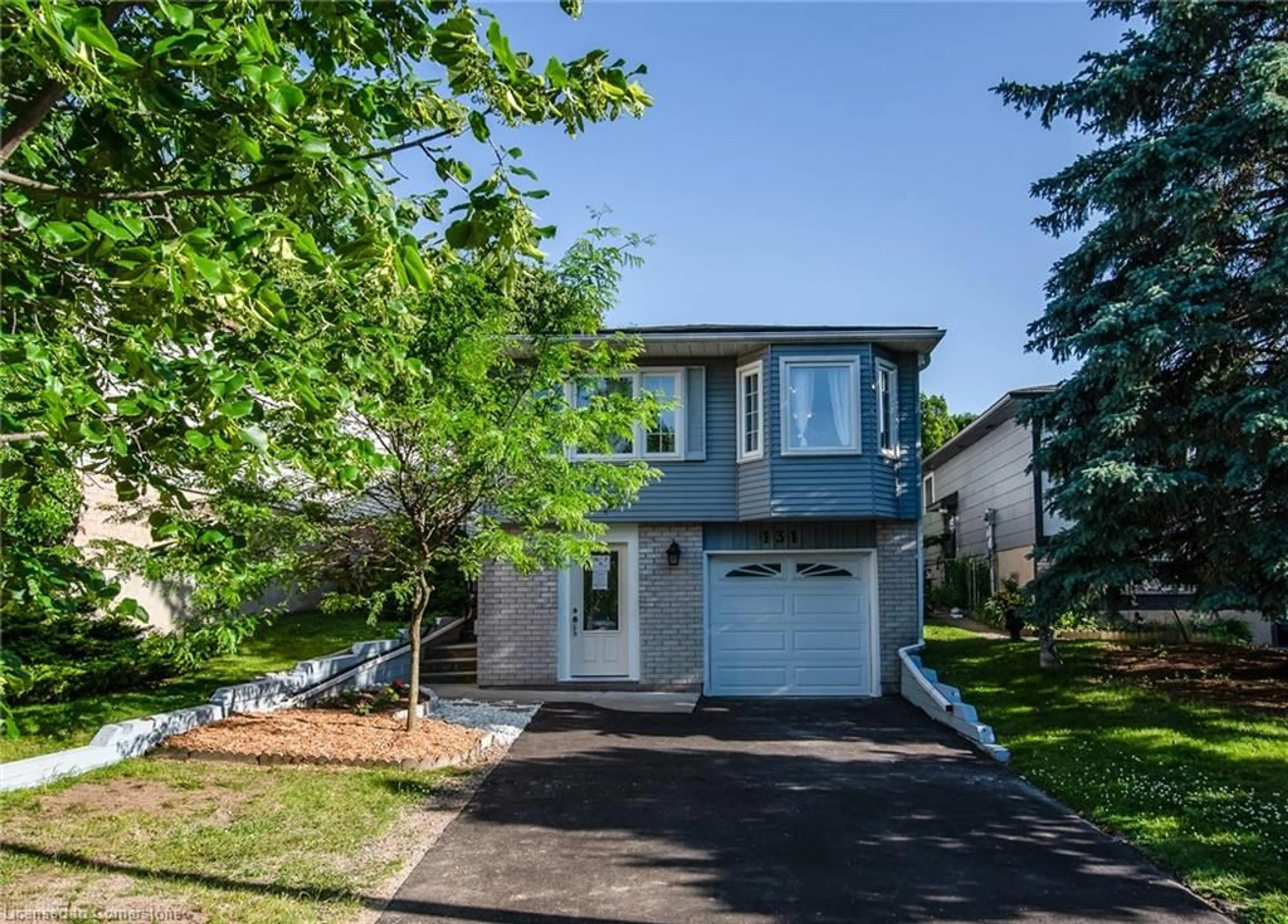 Home with vinyl exterior material, street for 131 Herron Pl, Waterloo Ontario N2T 1H2
