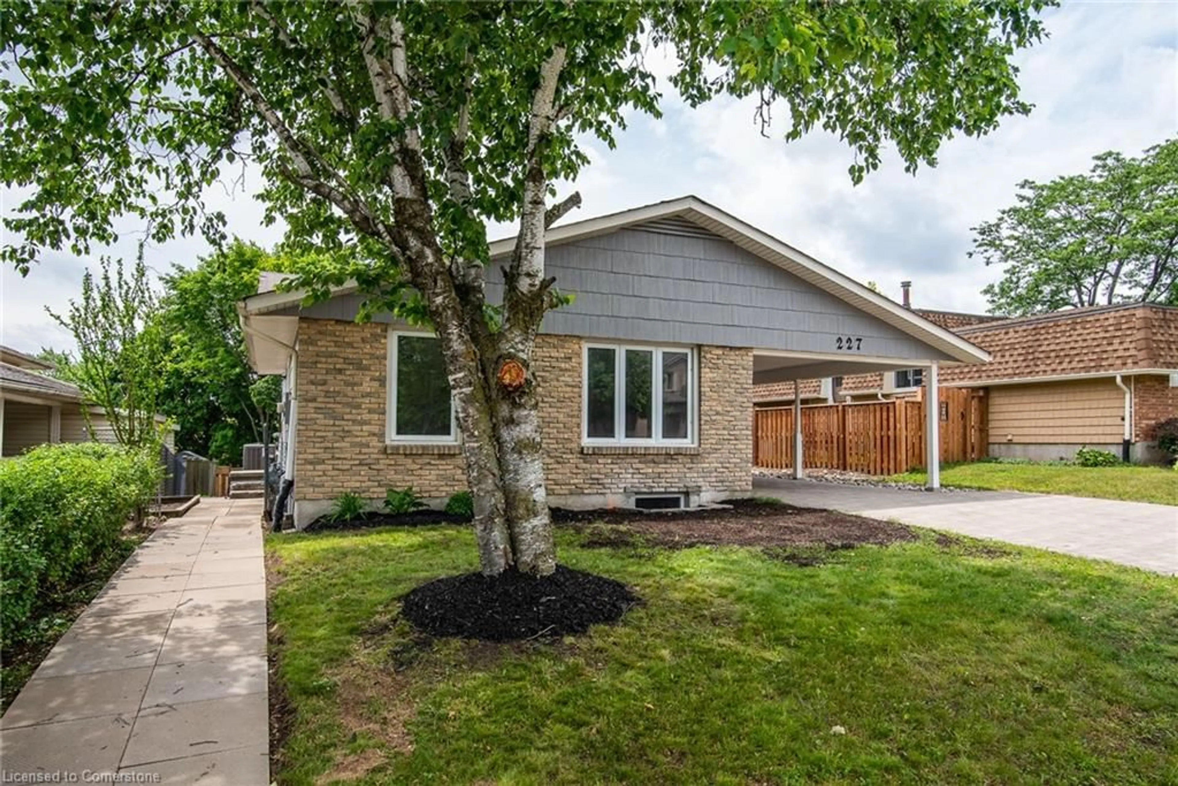 Home with brick exterior material, street for 227 Blackhorne Dr, Kitchener Ontario N2E 1Z2