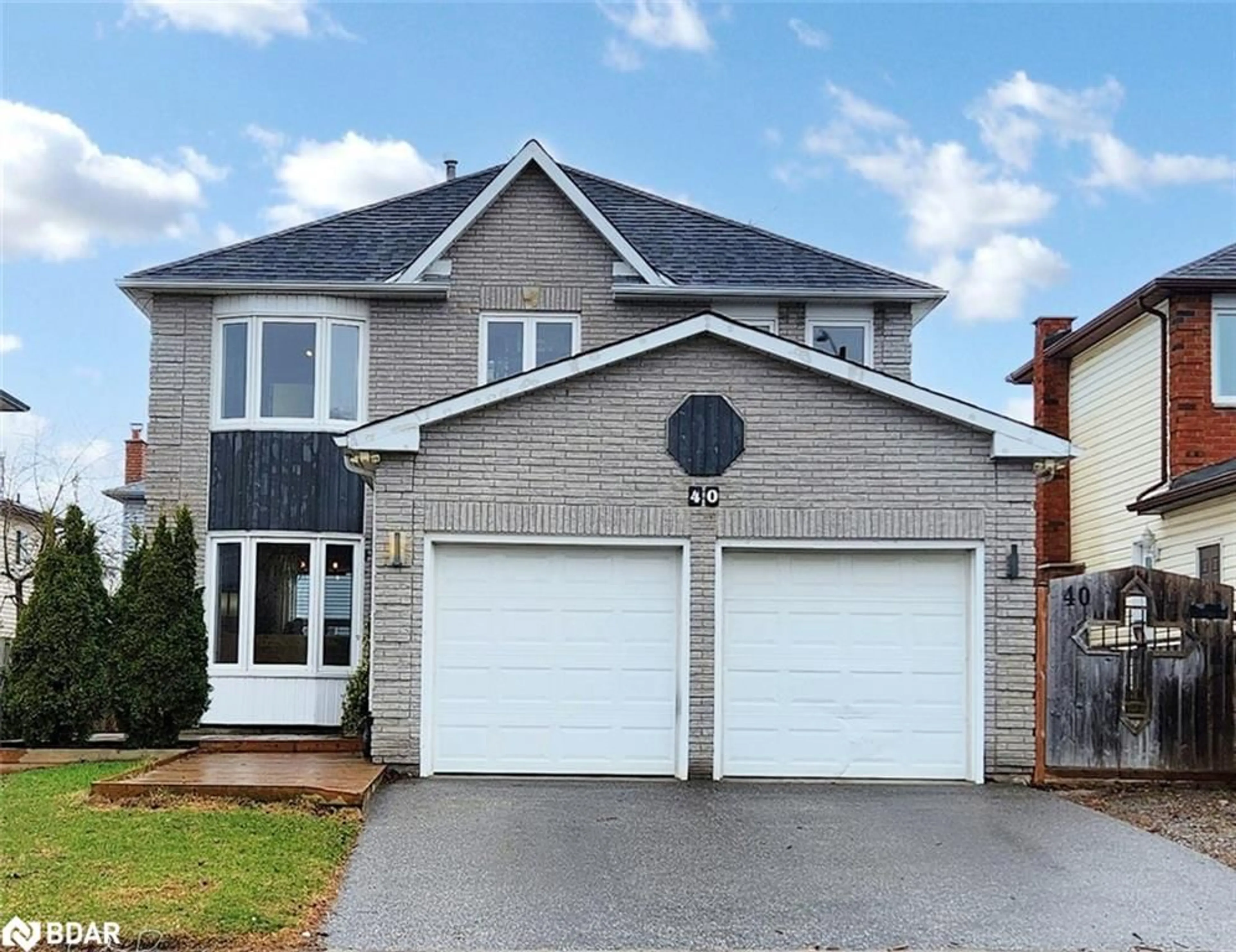 Home with brick exterior material, street for 40 Shakespeare Cres, Barrie Ontario L4N 6C1