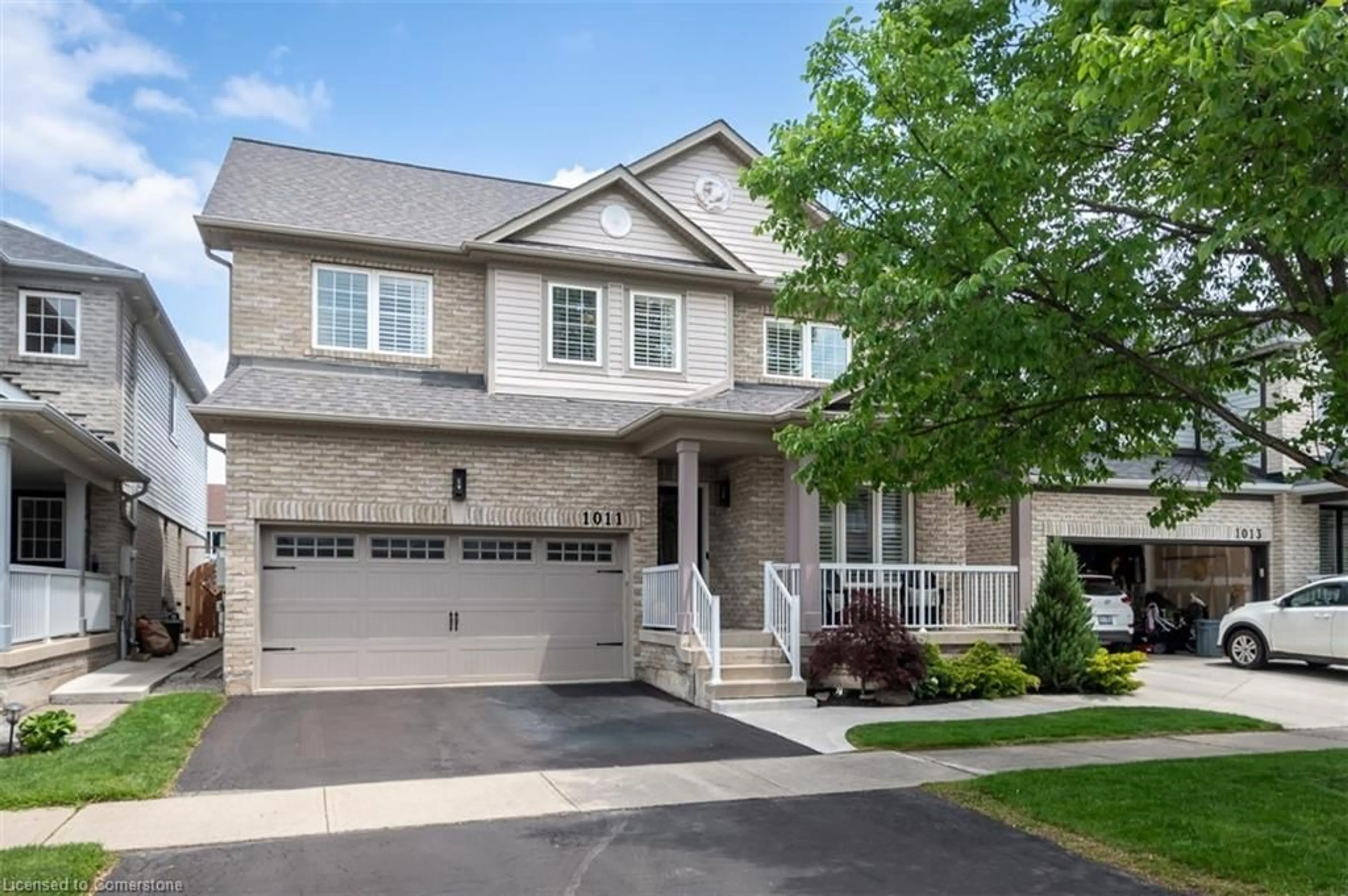 Home with brick exterior material, street for 1011 Vickerman Way, Milton Ontario L9T 0B9