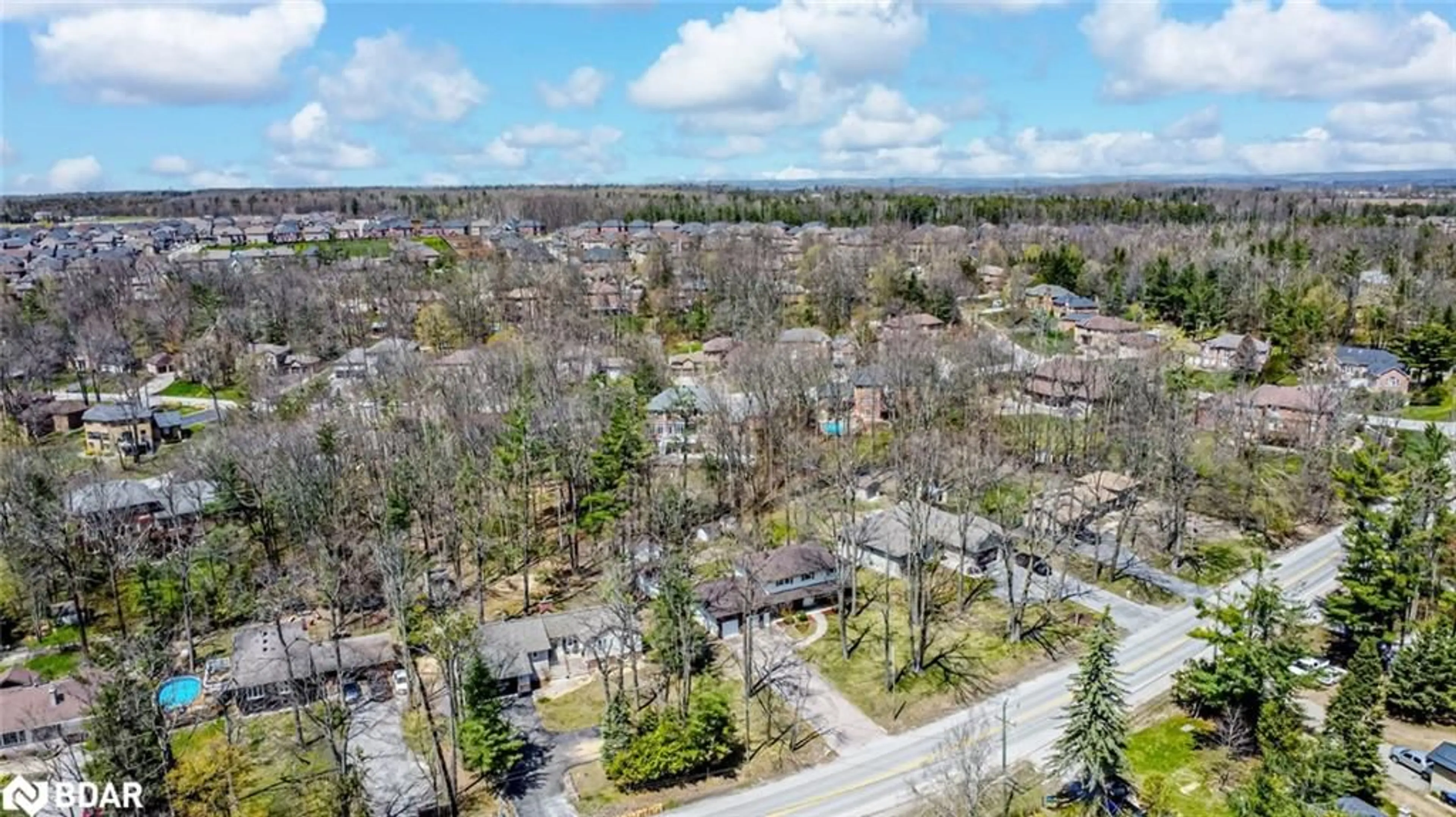 A pic from outside/outdoor area/front of a property/back of a property/a pic from drone, forest/trees view for 1166 Sunnidale Rd, Springwater Ontario L9X 0T4
