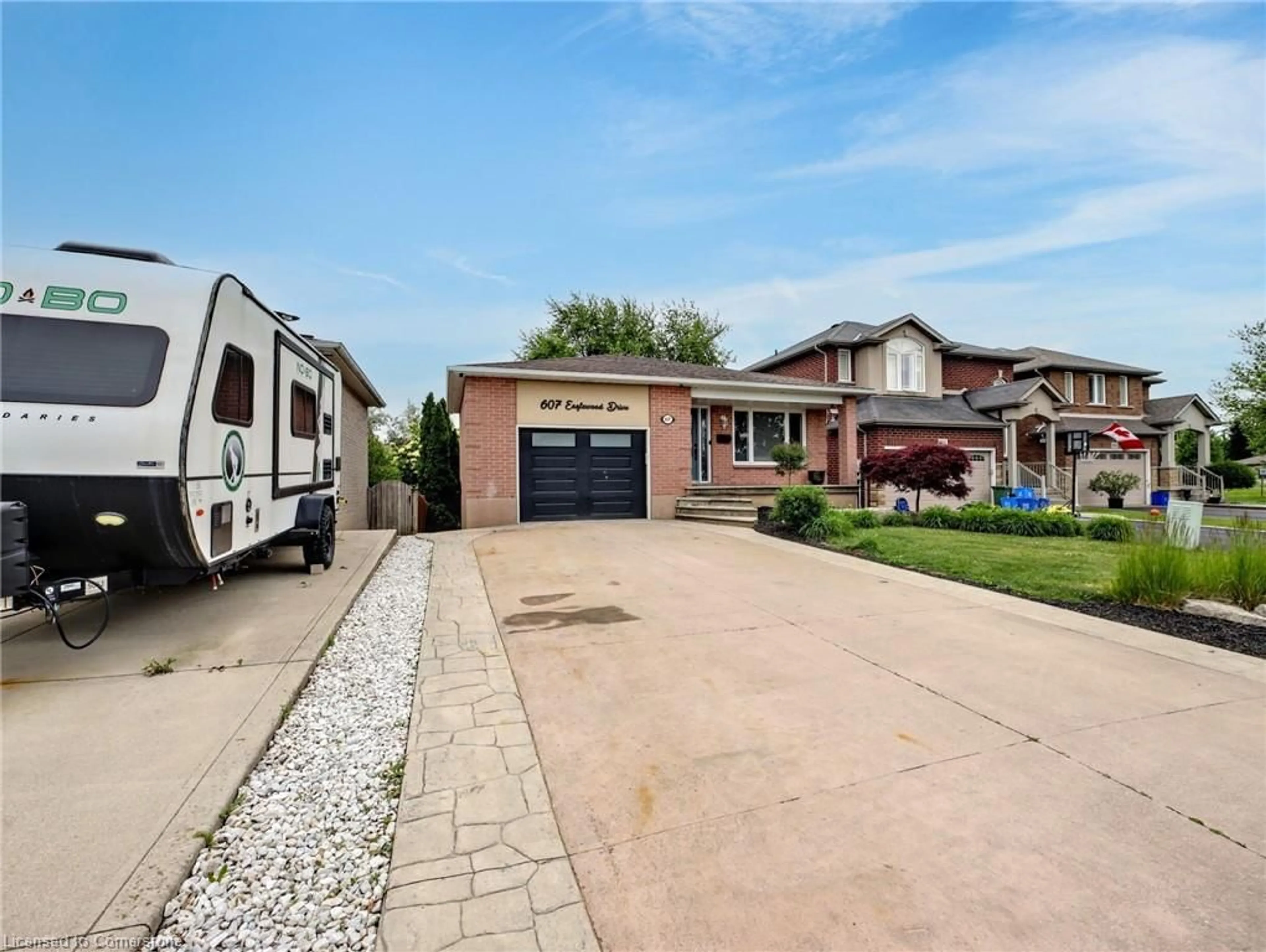 Home with brick exterior material, street for 607 Eaglewood Dr, Hamilton Ontario L8W 3J8