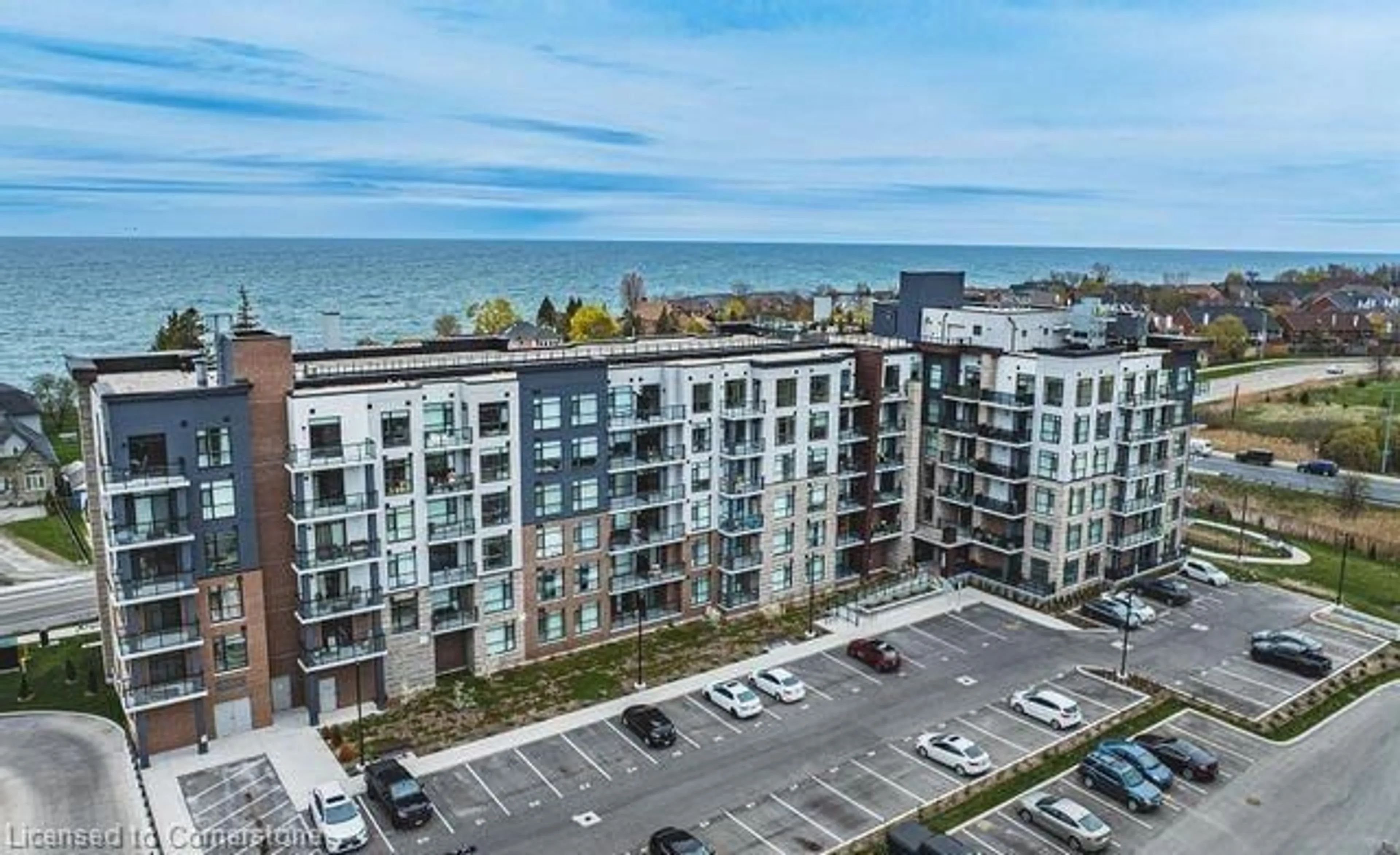 A pic from outside/outdoor area/front of a property/back of a property/a pic from drone, water/lake/river/ocean view for 600 North Service Rd #222, Hamilton Ontario L8E 0L2