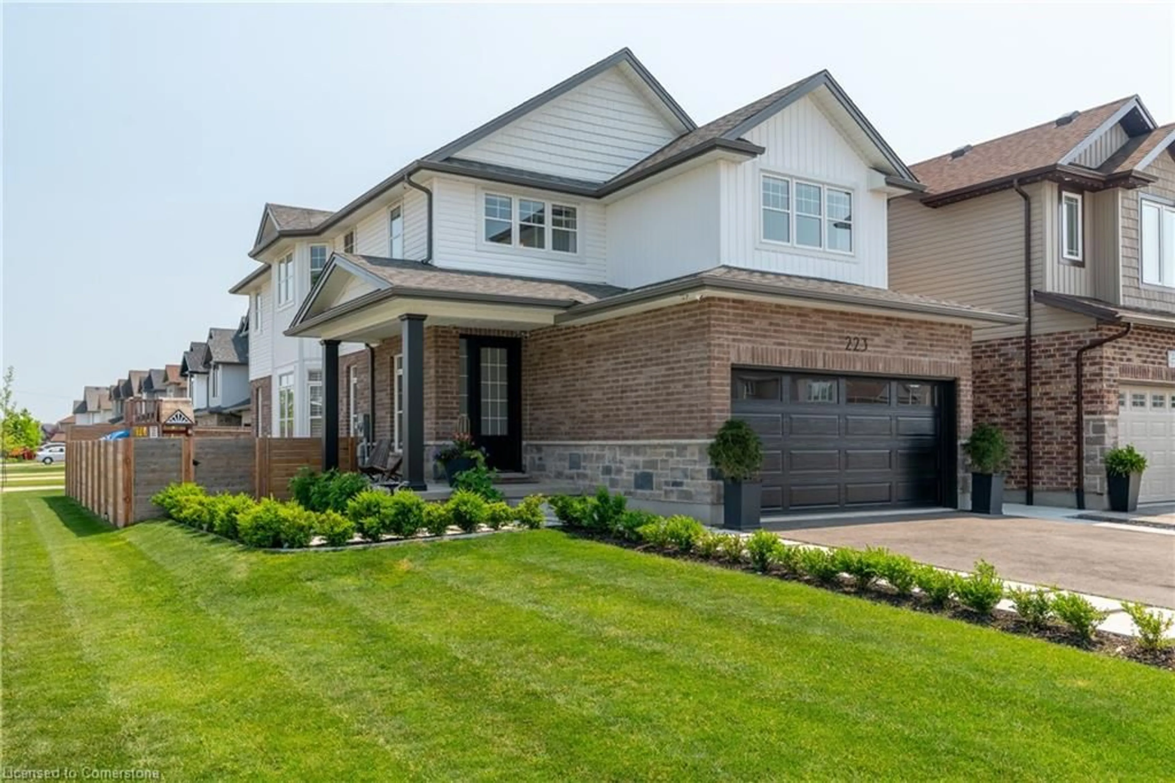 Home with brick exterior material, street for 223 Fleming Rd, Guelph Ontario N1E 0K7