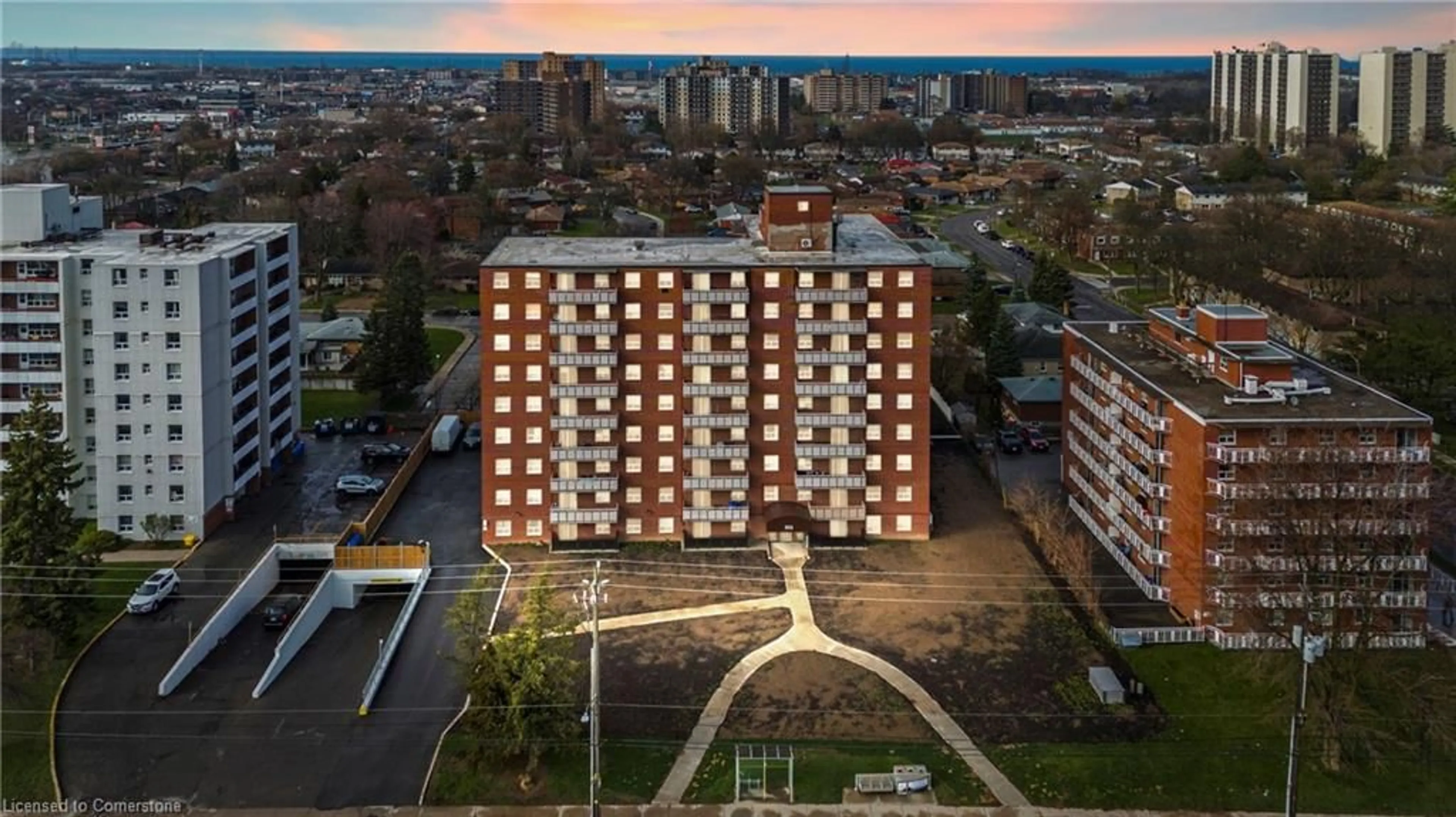 A pic from outside/outdoor area/front of a property/back of a property/a pic from drone, city buildings view from balcony for 851 Queenston Rd #105, Hamilton Ontario L8G 1B4