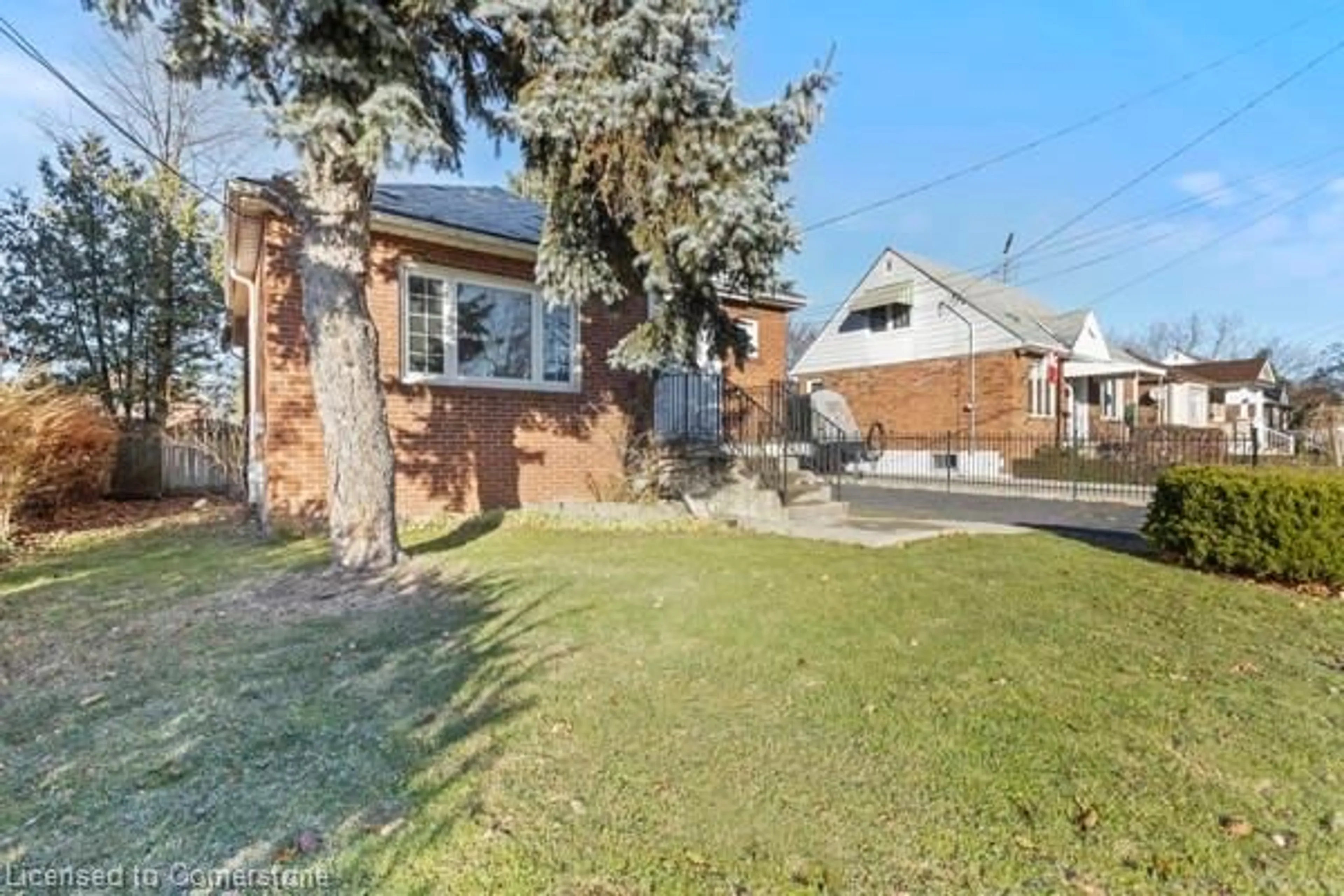 A pic from outside/outdoor area/front of a property/back of a property/a pic from drone, street for 50 West 4th St, Hamilton Ontario L9C 3M4