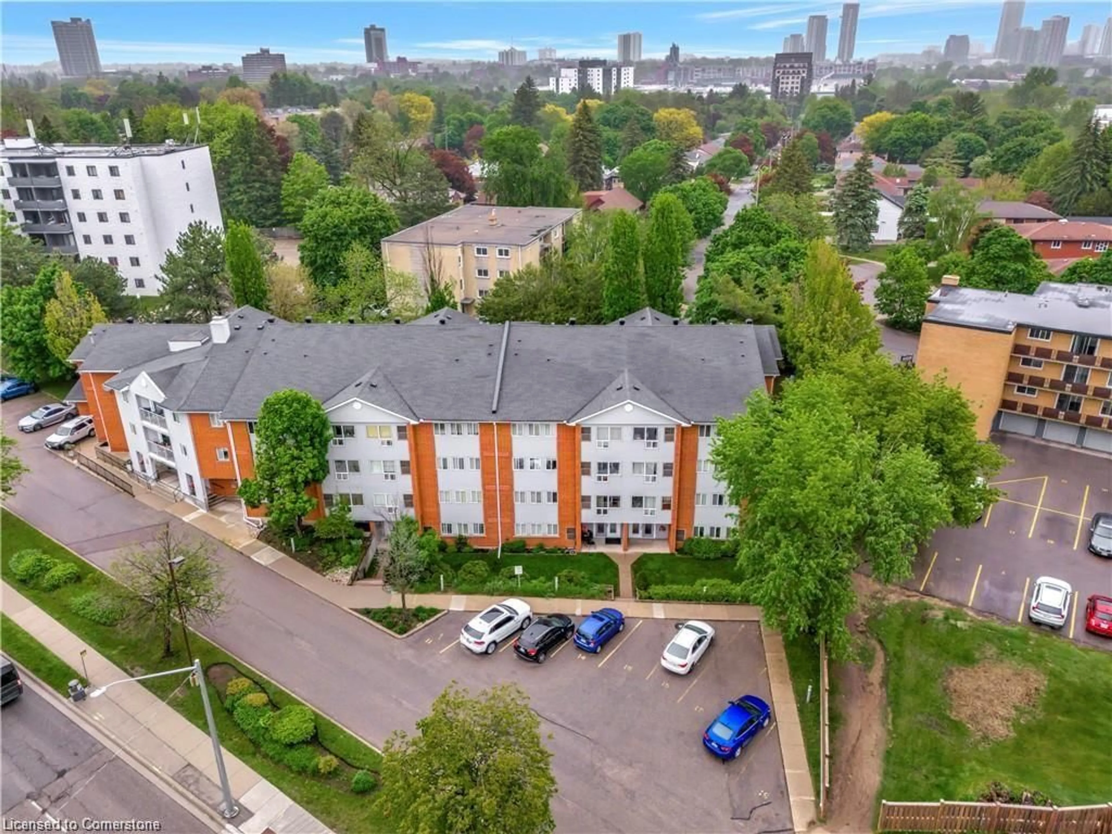 A pic from outside/outdoor area/front of a property/back of a property/a pic from drone, city buildings view from balcony for 500 Westmount Rd #101, Kitchener Ontario N2M 5M9