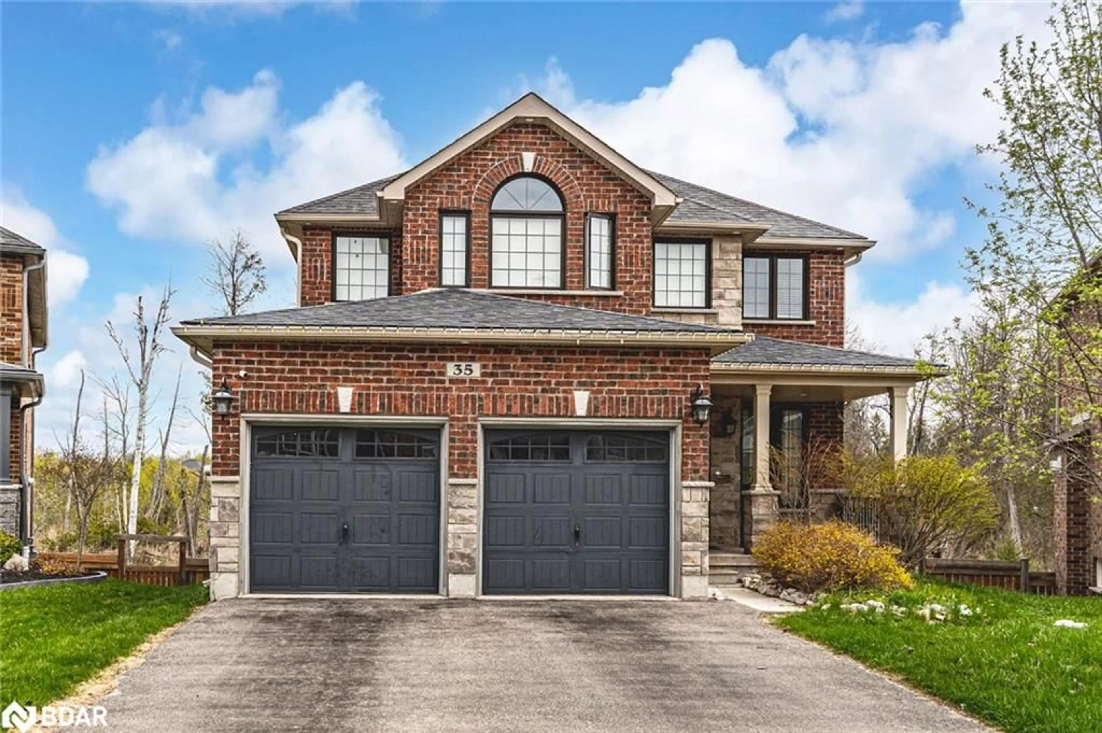 Home with brick exterior material, street for 35 Marta Cres, Barrie Ontario L4N 3N6