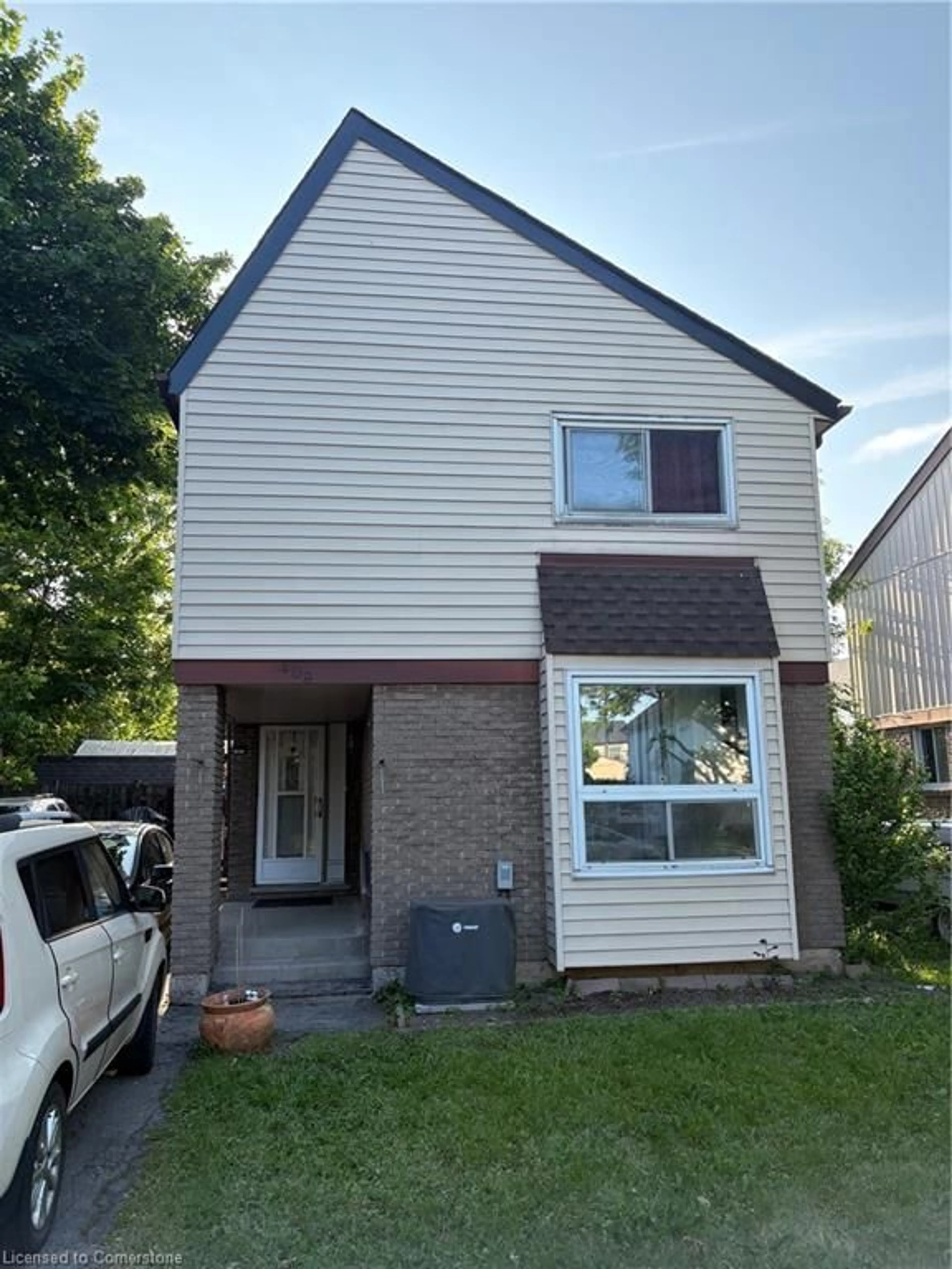 Home with vinyl exterior material, street for 408 East 21st St, Hamilton Ontario L8V 2V2