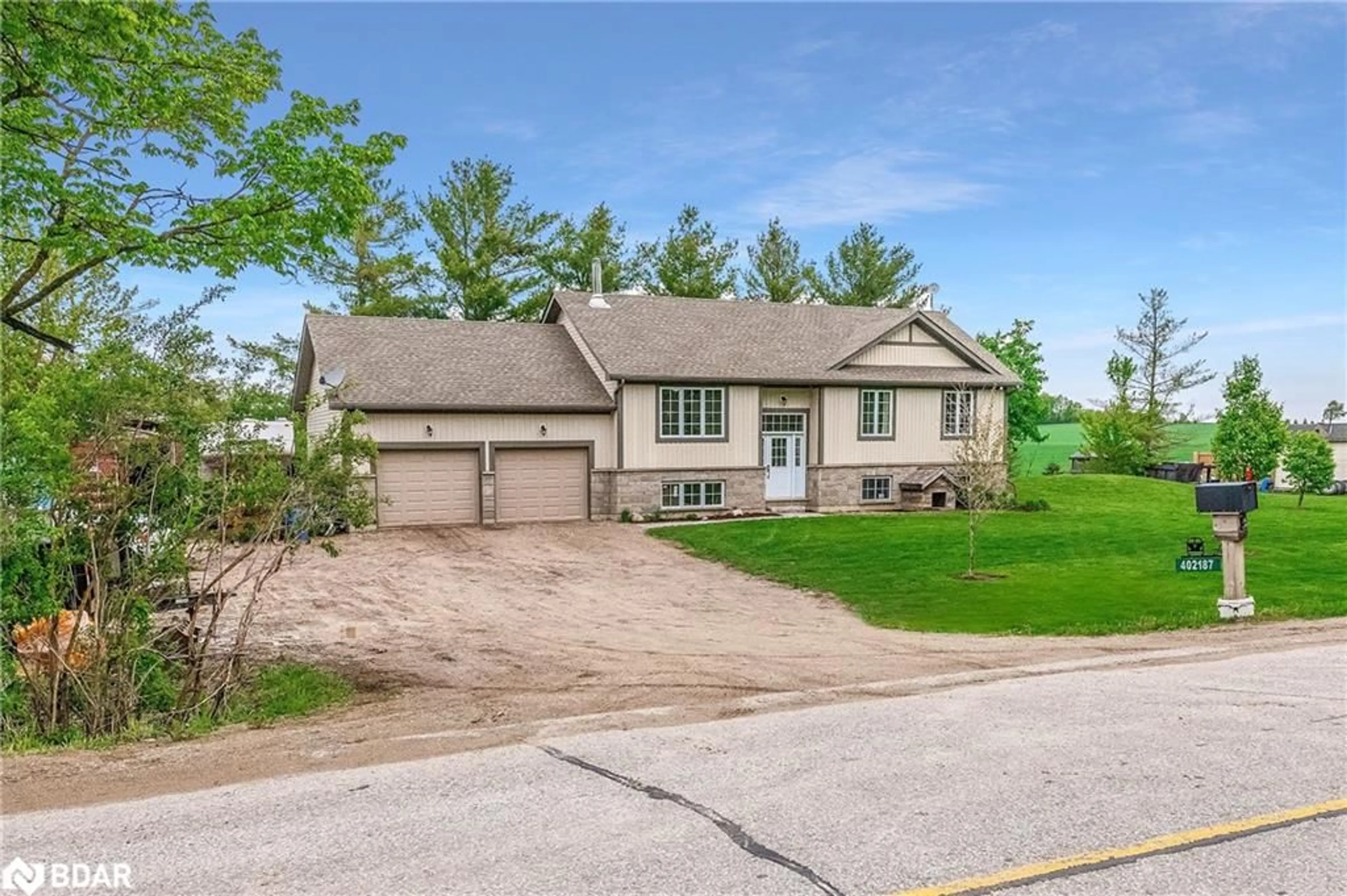 Home with brick exterior material, street for 402187 County Road 15, Grand Valley Ontario L9W 3B5