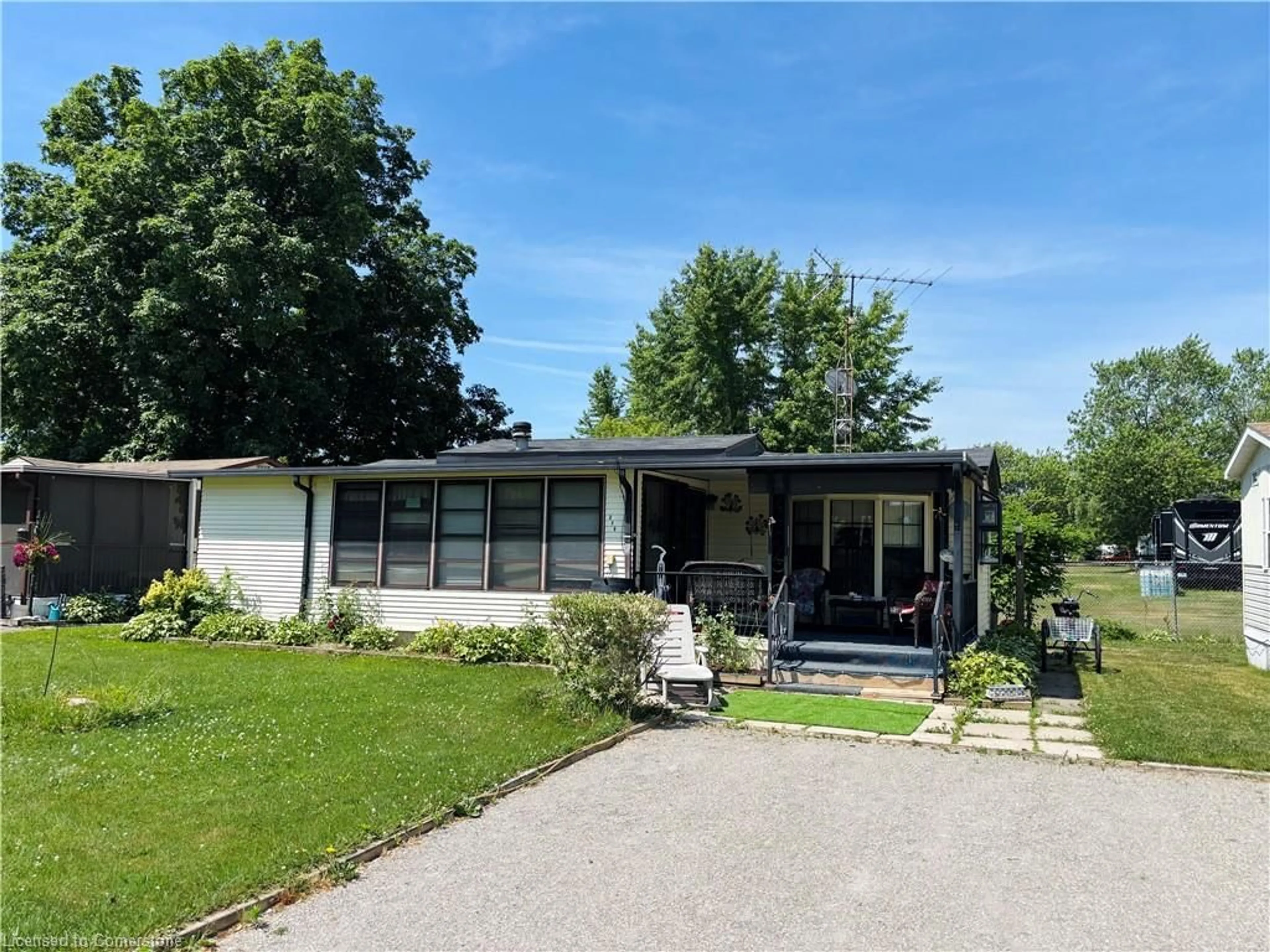 Home with vinyl exterior material, street for 1001 Haldimand Road 17 Rd #249, Cayuga Ontario N0A 1E0