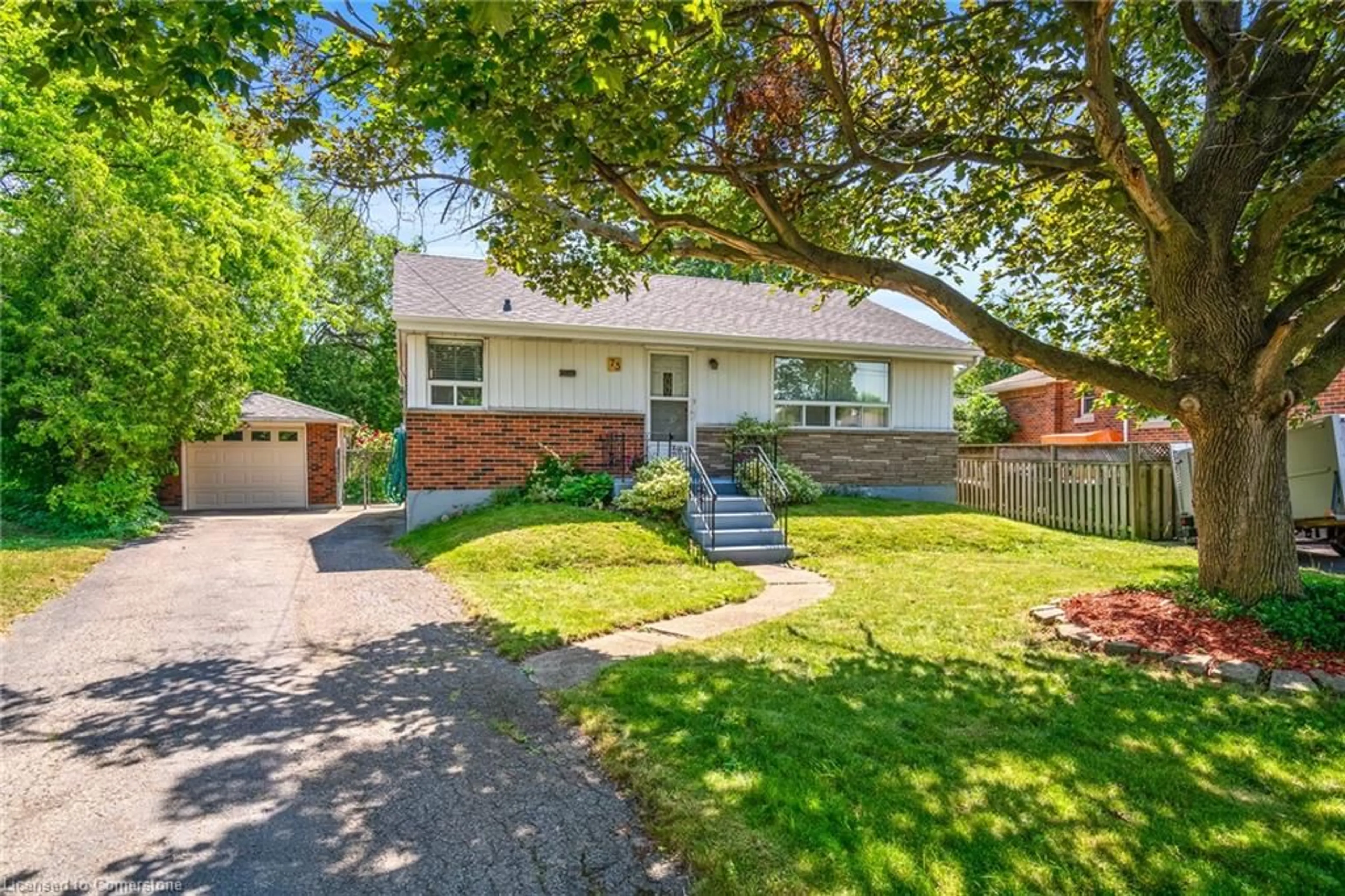 Home with brick exterior material, street for 73 Welbourn Dr, Hamilton Ontario L9A 3N5