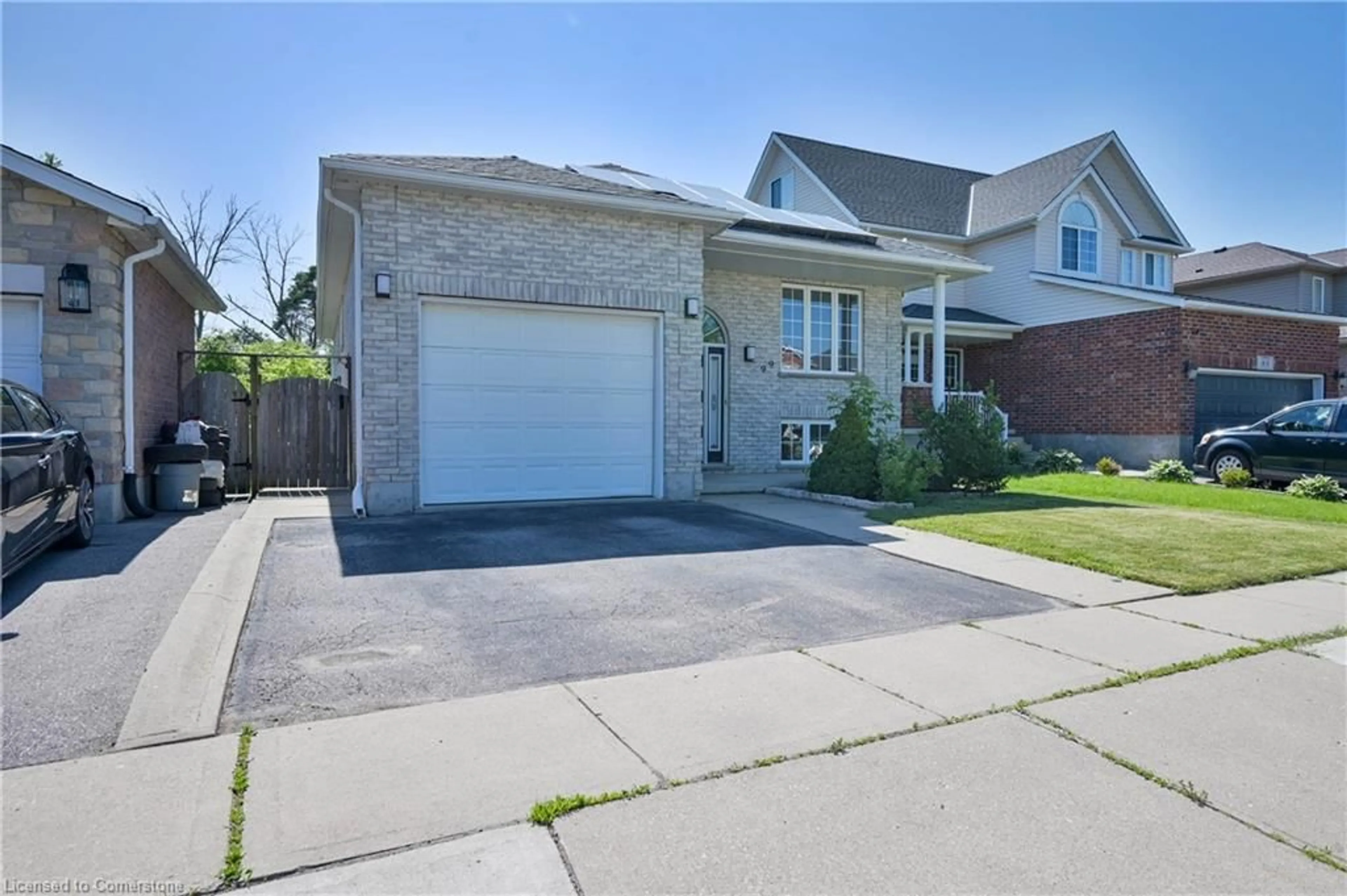 Home with brick exterior material, street for 99 Langlaw Dr, Cambridge Ontario N1P 1J1