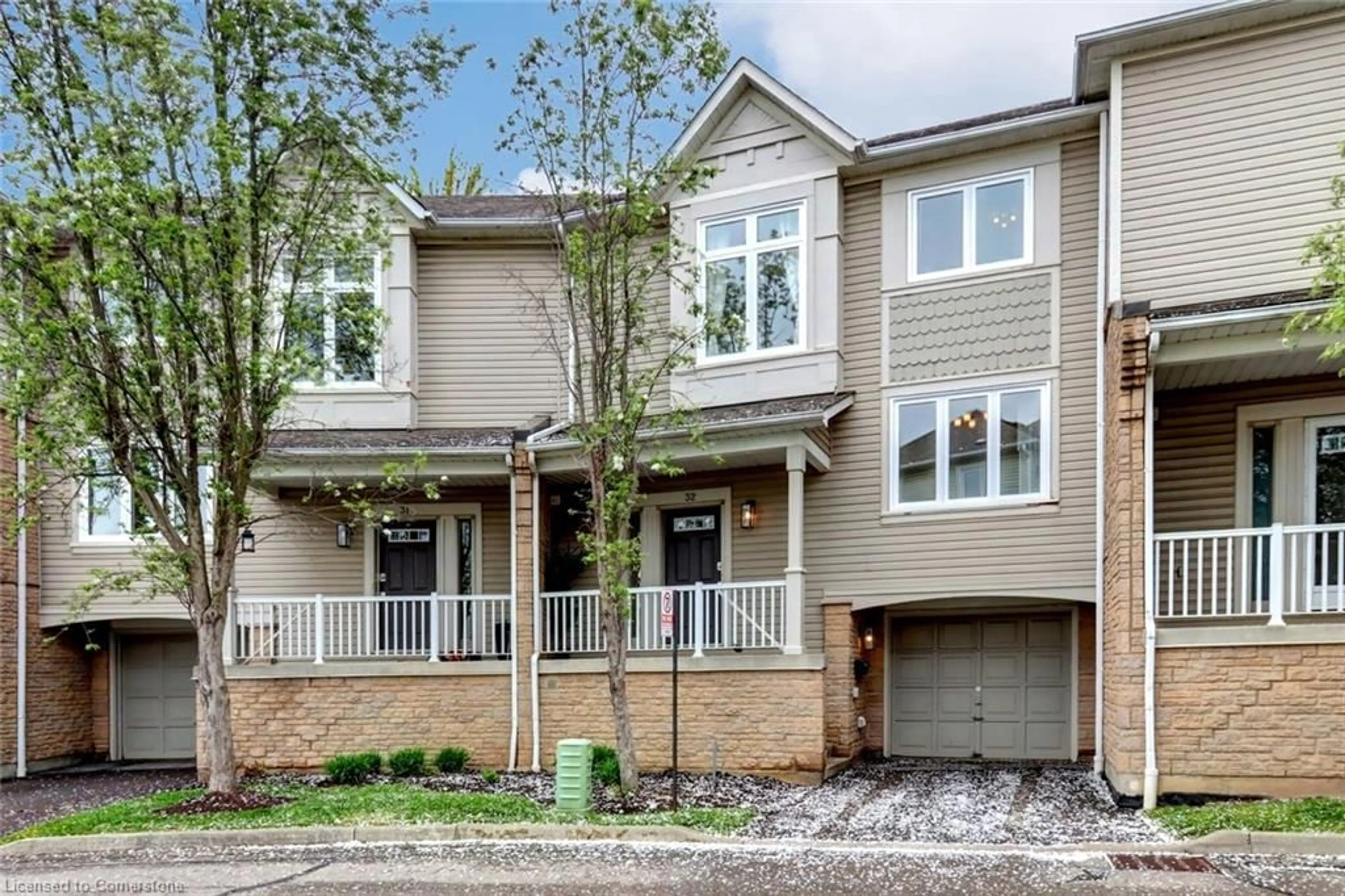 Home with brick exterior material, street for 7101 Branigan Gate #32, Mississauga Ontario L5N 7S2