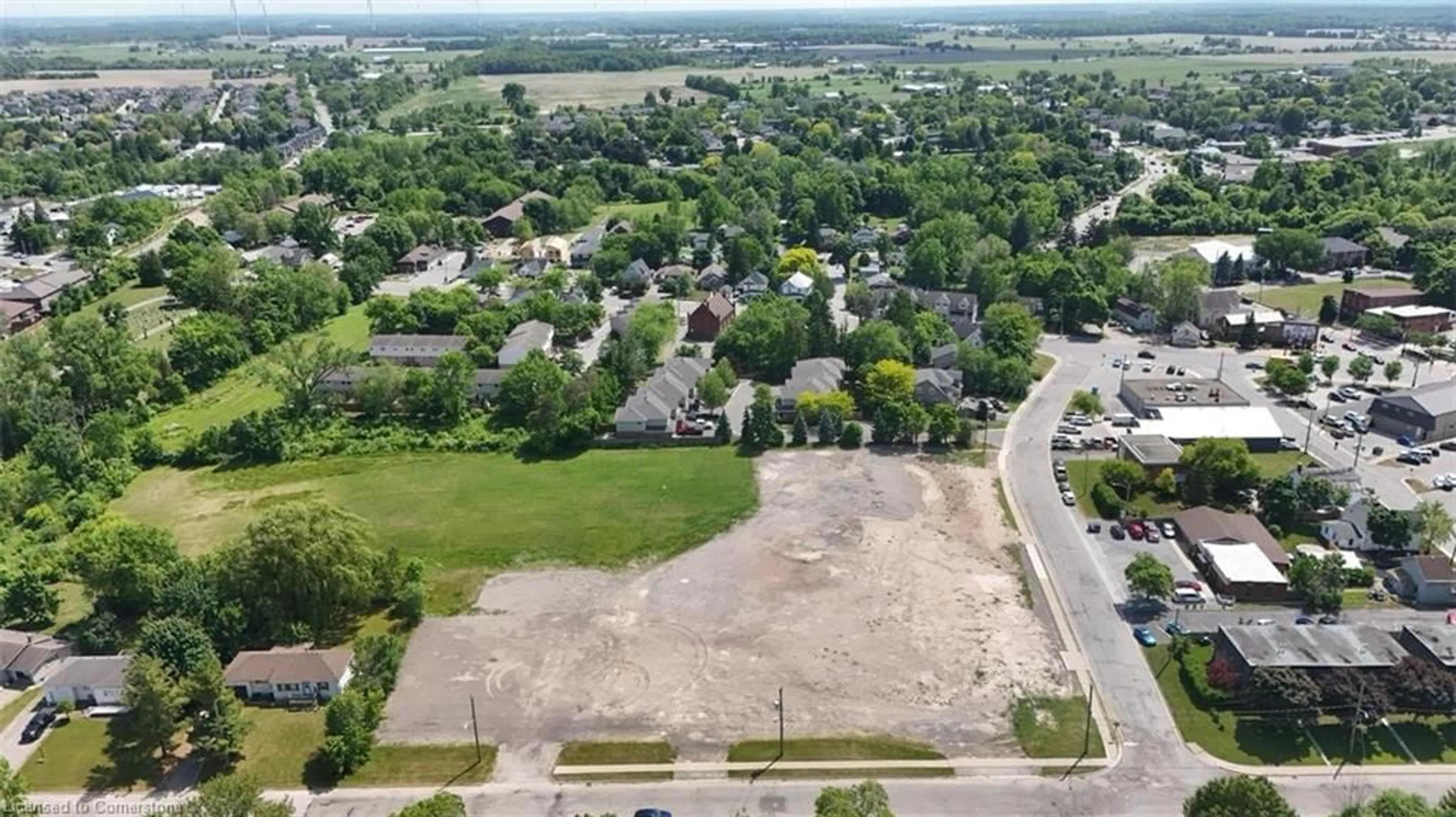 A pic from outside/outdoor area/front of a property/back of a property/a pic from drone, street for 132 College St #1, Smithville Ontario L0R 2A0