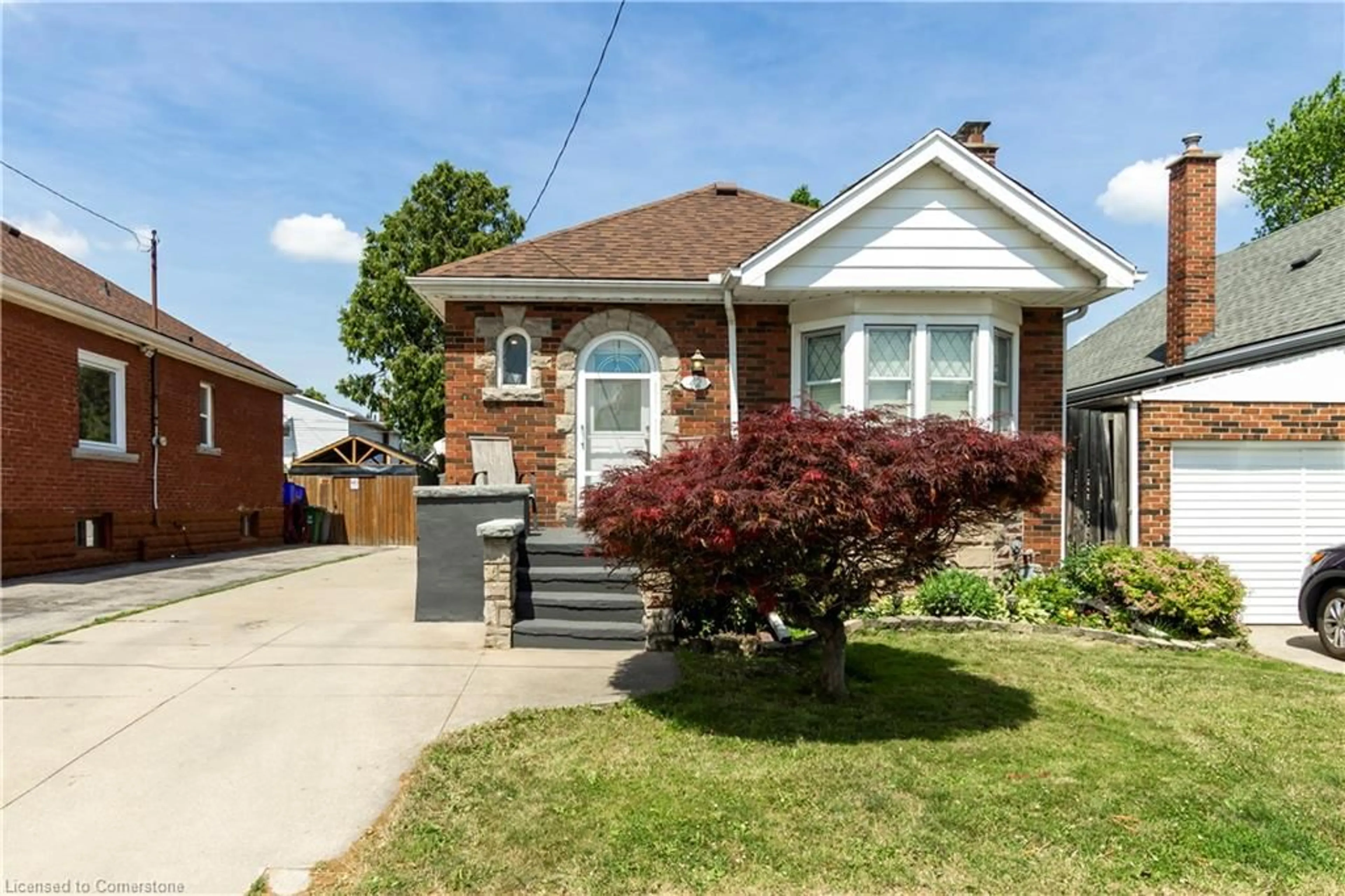 Home with brick exterior material, street for 42 Cameron Ave, Hamilton Ontario L8K 2W9