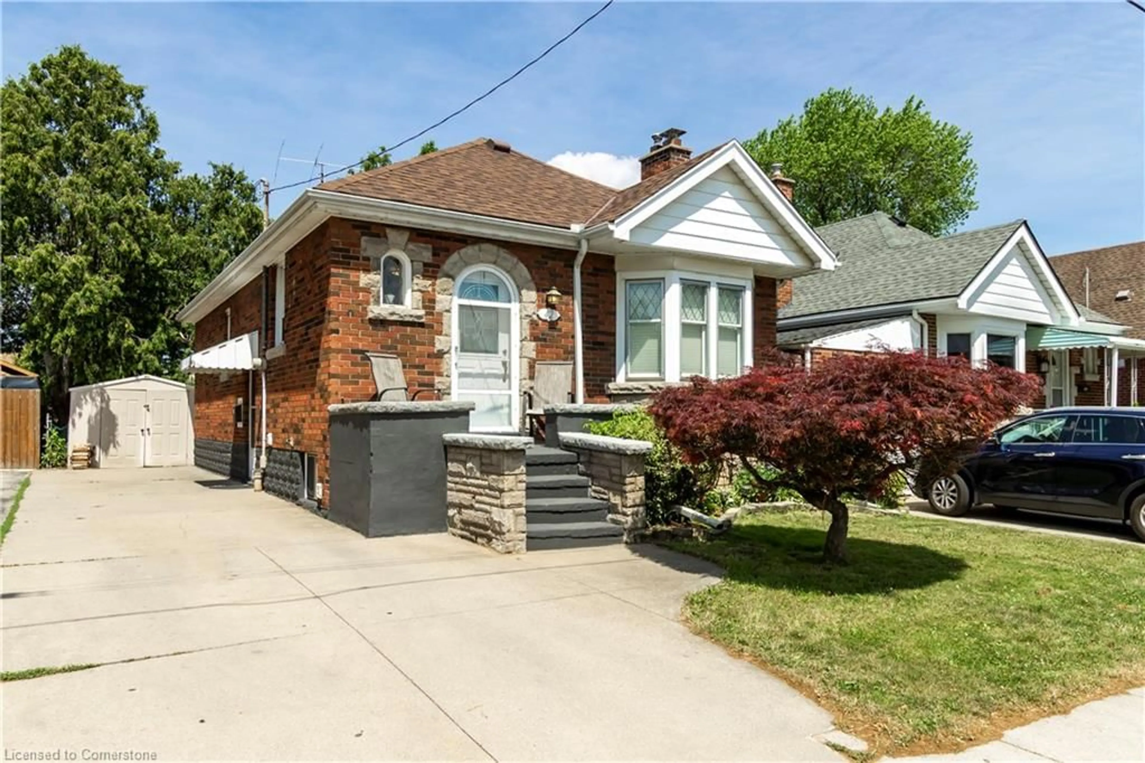 Home with brick exterior material, street for 42 Cameron Ave, Hamilton Ontario L8K 2W9