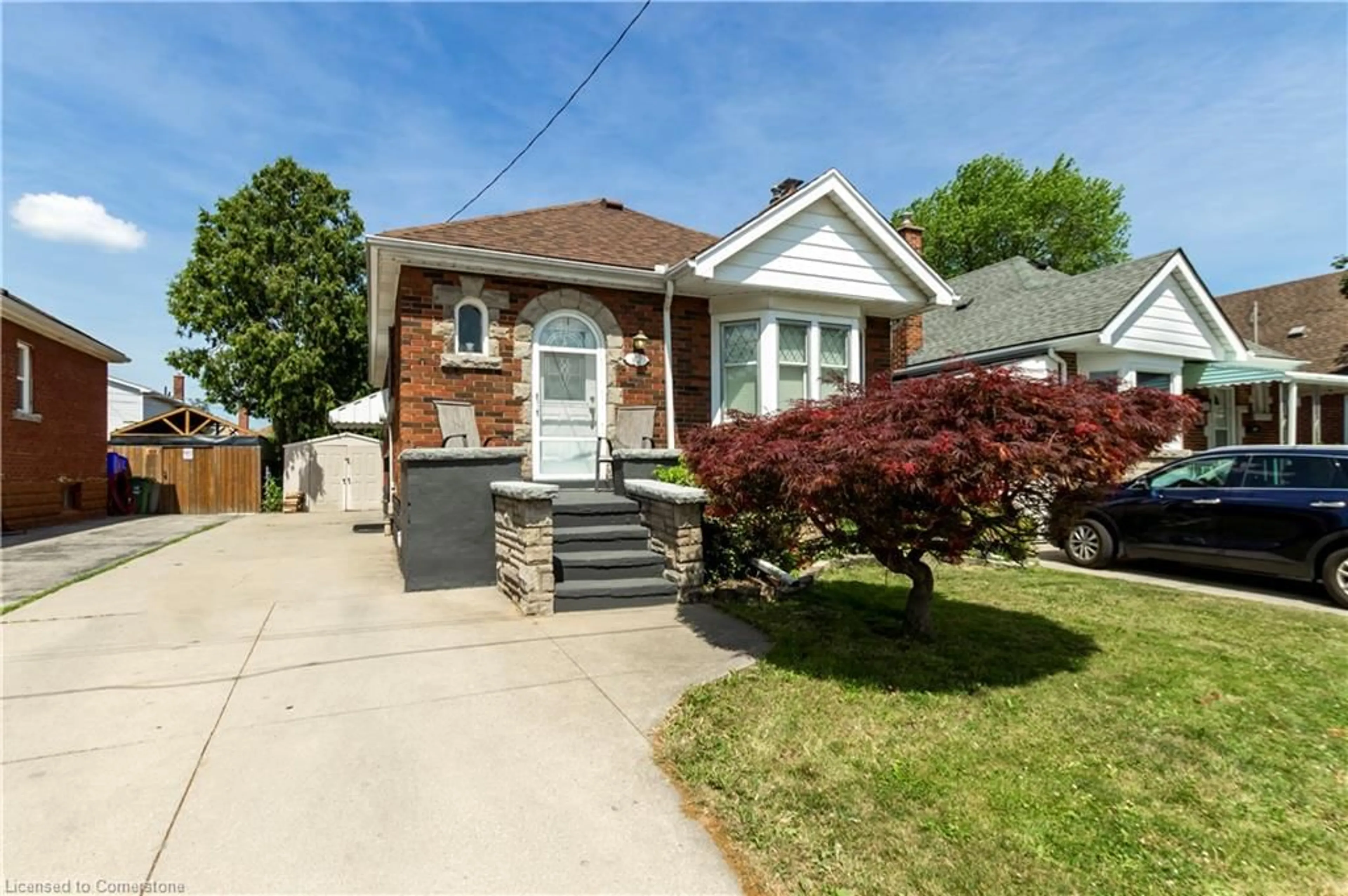 Home with brick exterior material, street for 42 Cameron Ave, Hamilton Ontario L8K 2W9