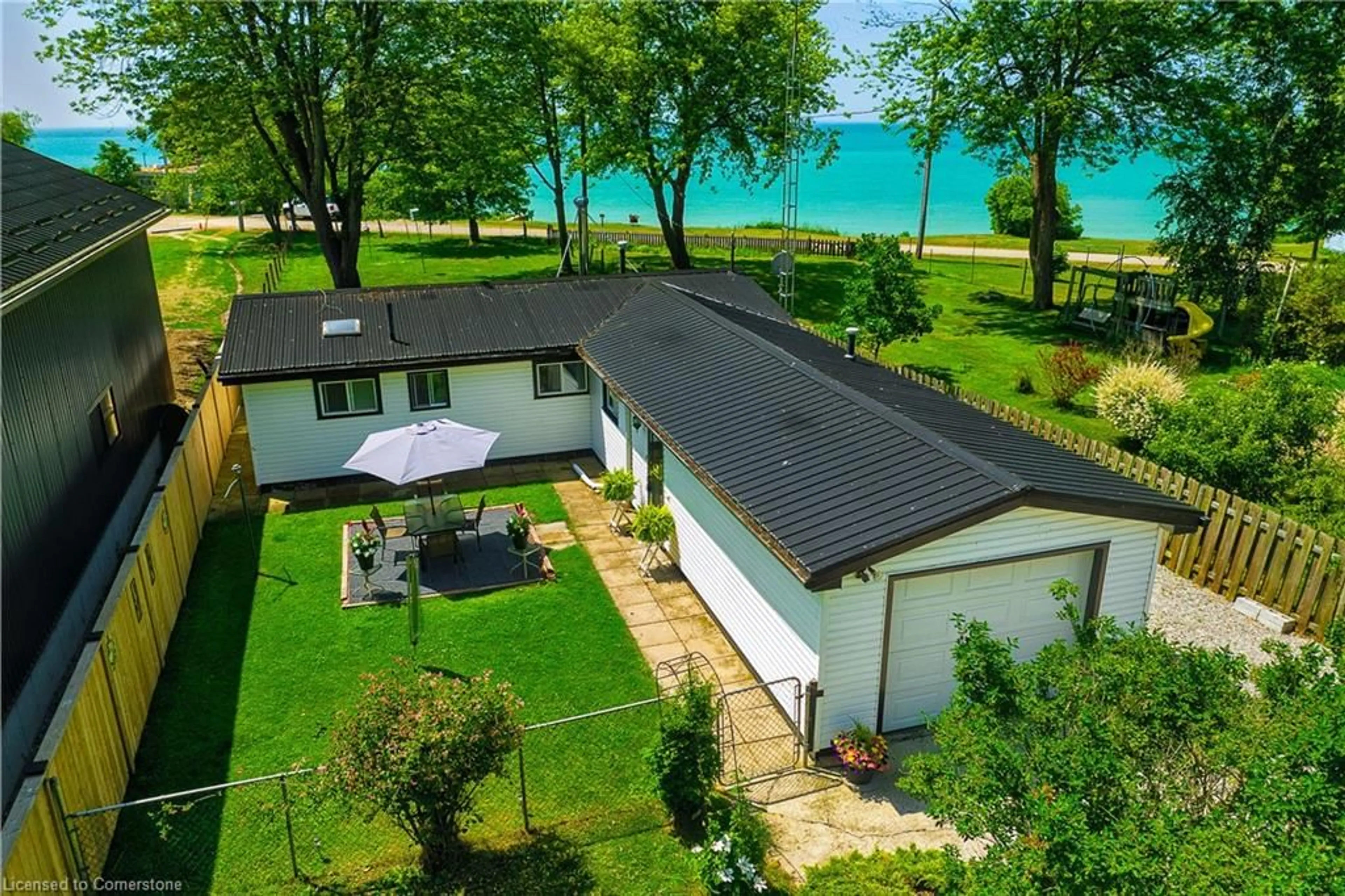 A pic from outside/outdoor area/front of a property/back of a property/a pic from drone, water/lake/river/ocean view for 3058 Lakeshore Rd, Dunnville Ontario N1A 2W8