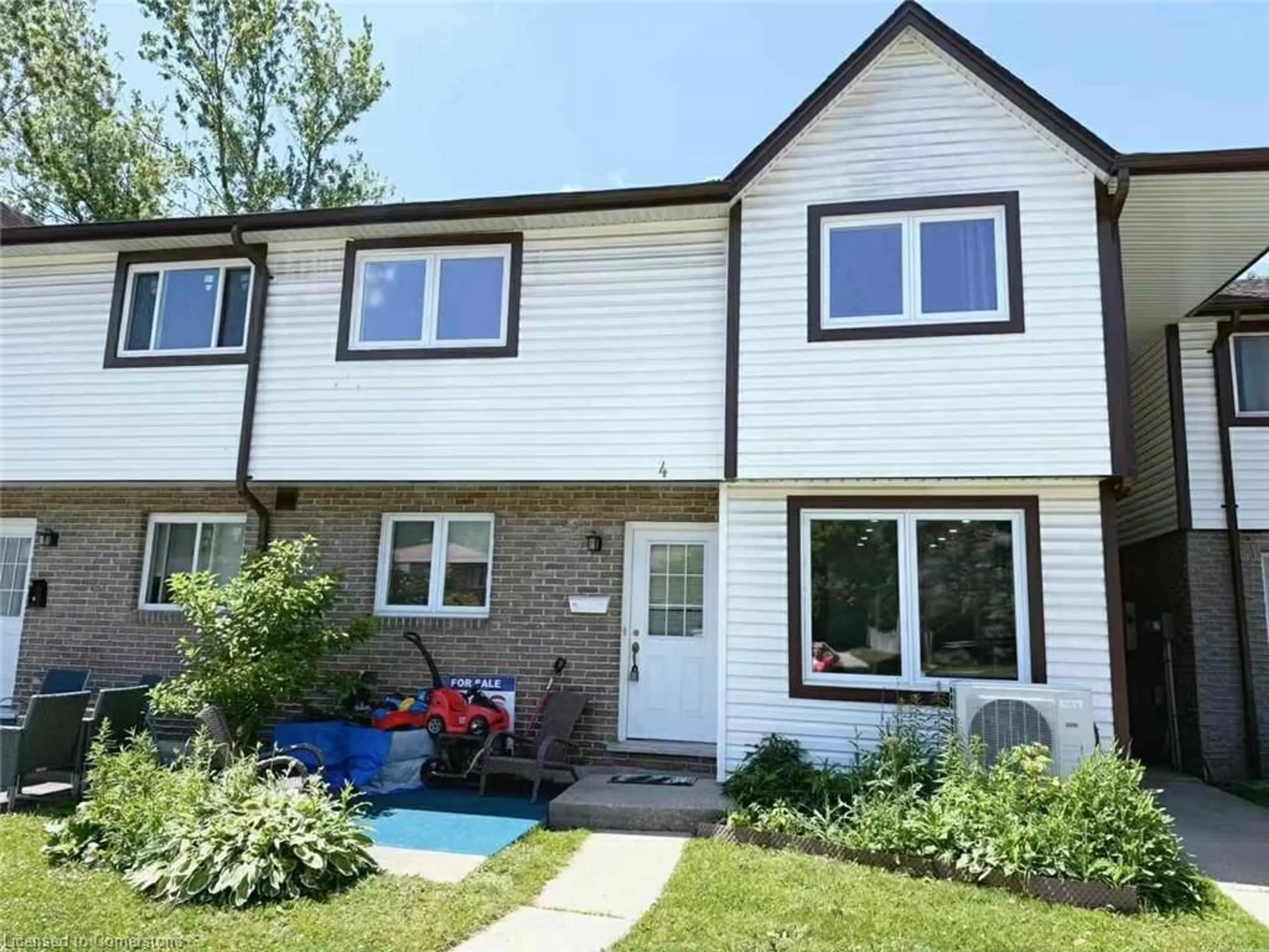 Home with vinyl exterior material, street for 445 Pioneer Dr #4, Kitchener Ontario N2P 1L8