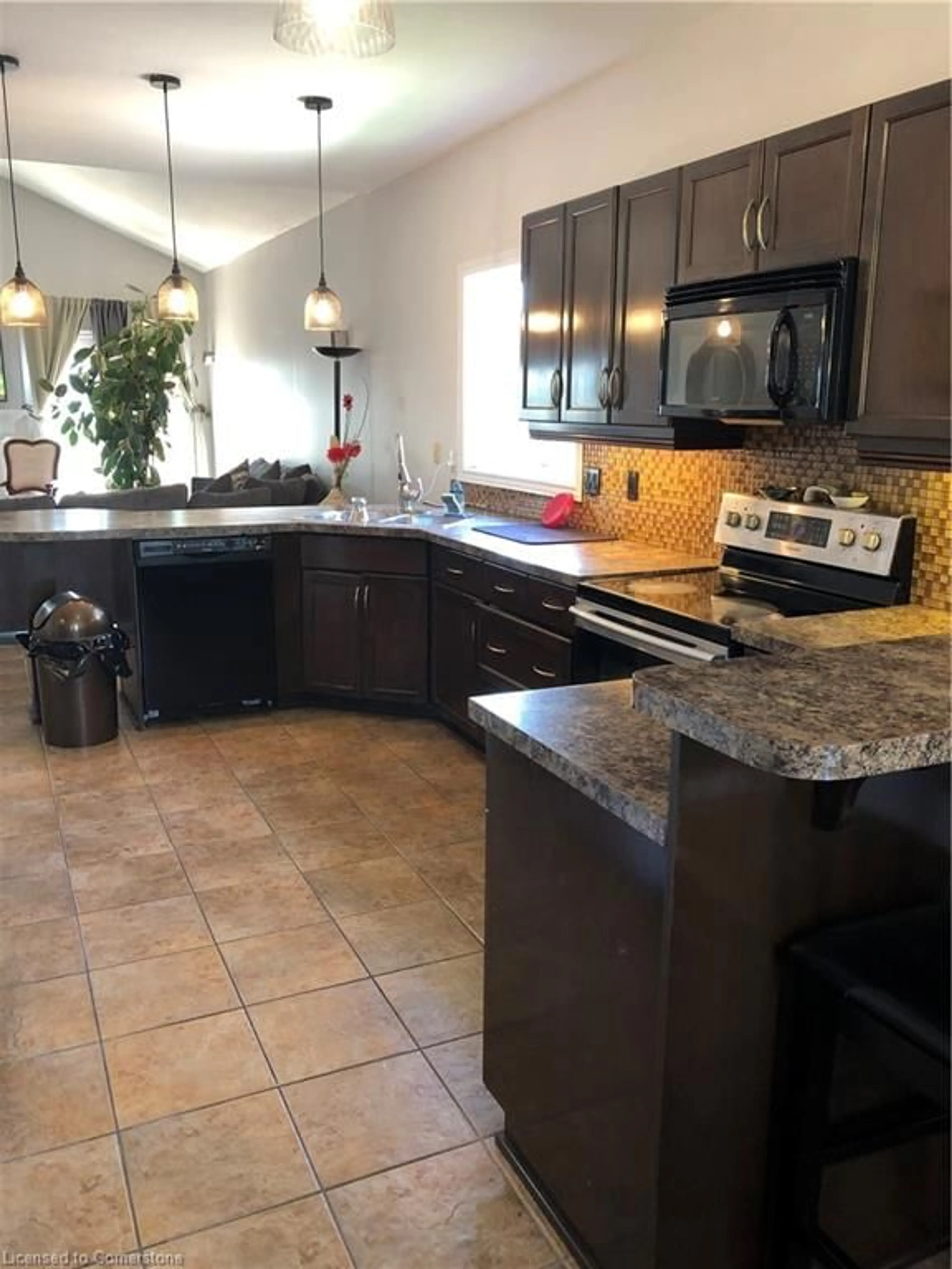 Open concept kitchen, ceramic/tile floor for 91 Candlewood Dr, Stoney Creek Ontario L8J 0A3
