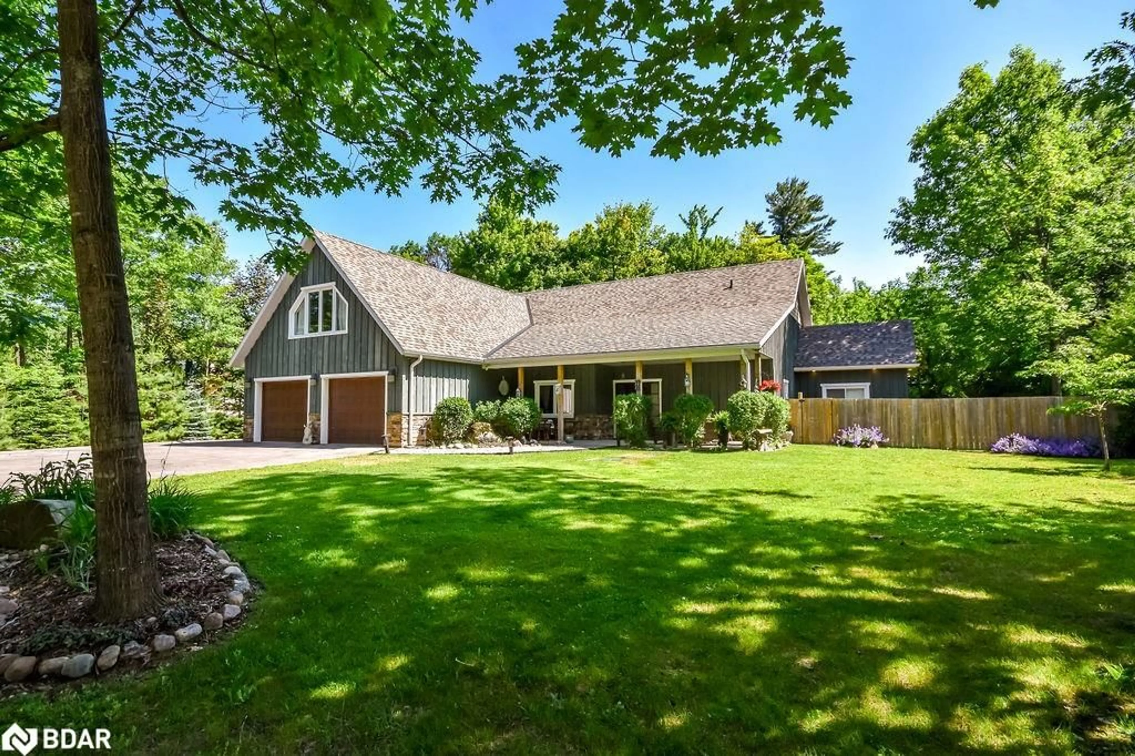 Home with vinyl exterior material, street for 1455 Tiny Beaches Rd, Tiny Ontario L9M 0J2