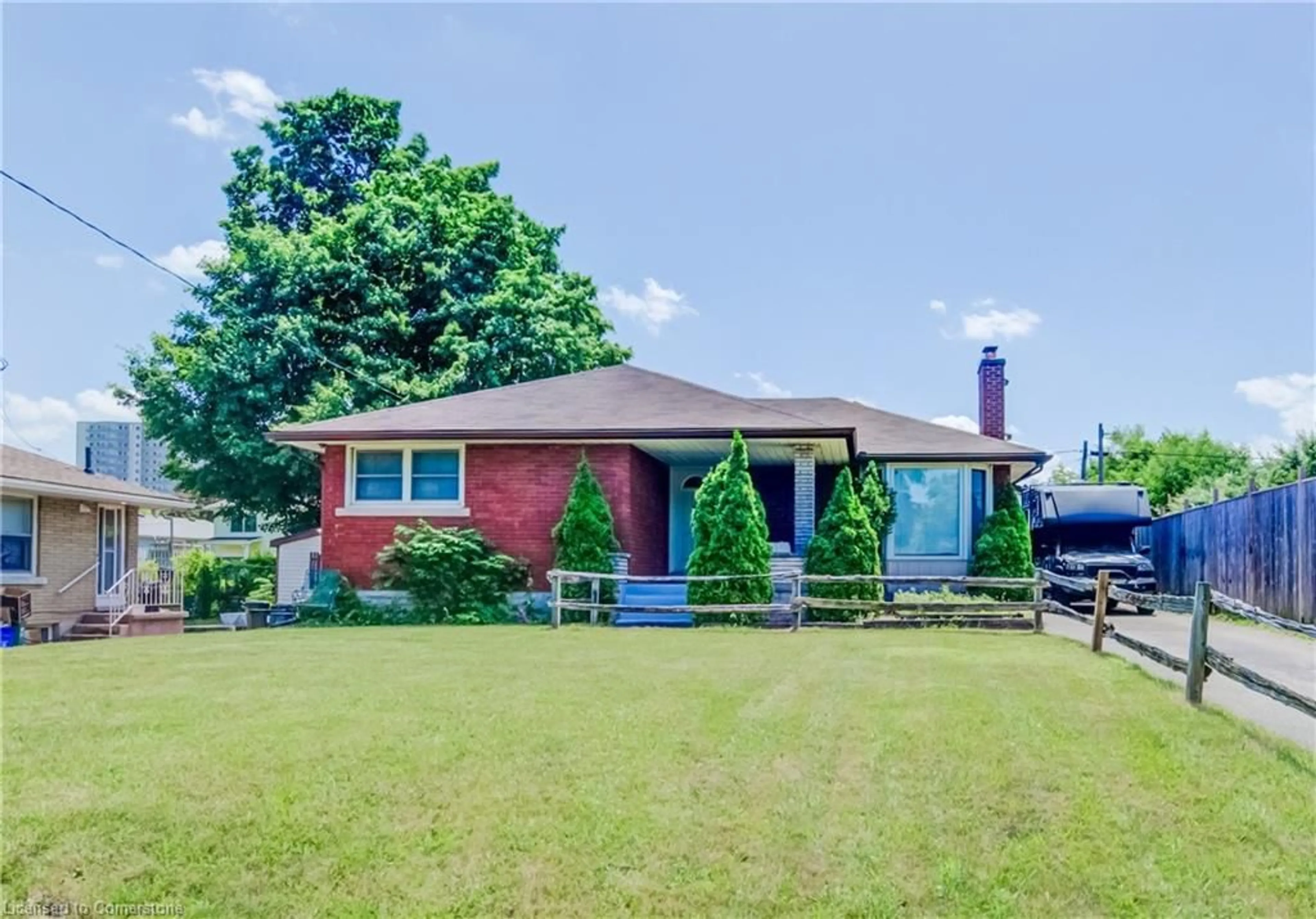 Home with brick exterior material, street for 141 Woodhaven Rd, Kitchener Ontario N2C 1V2