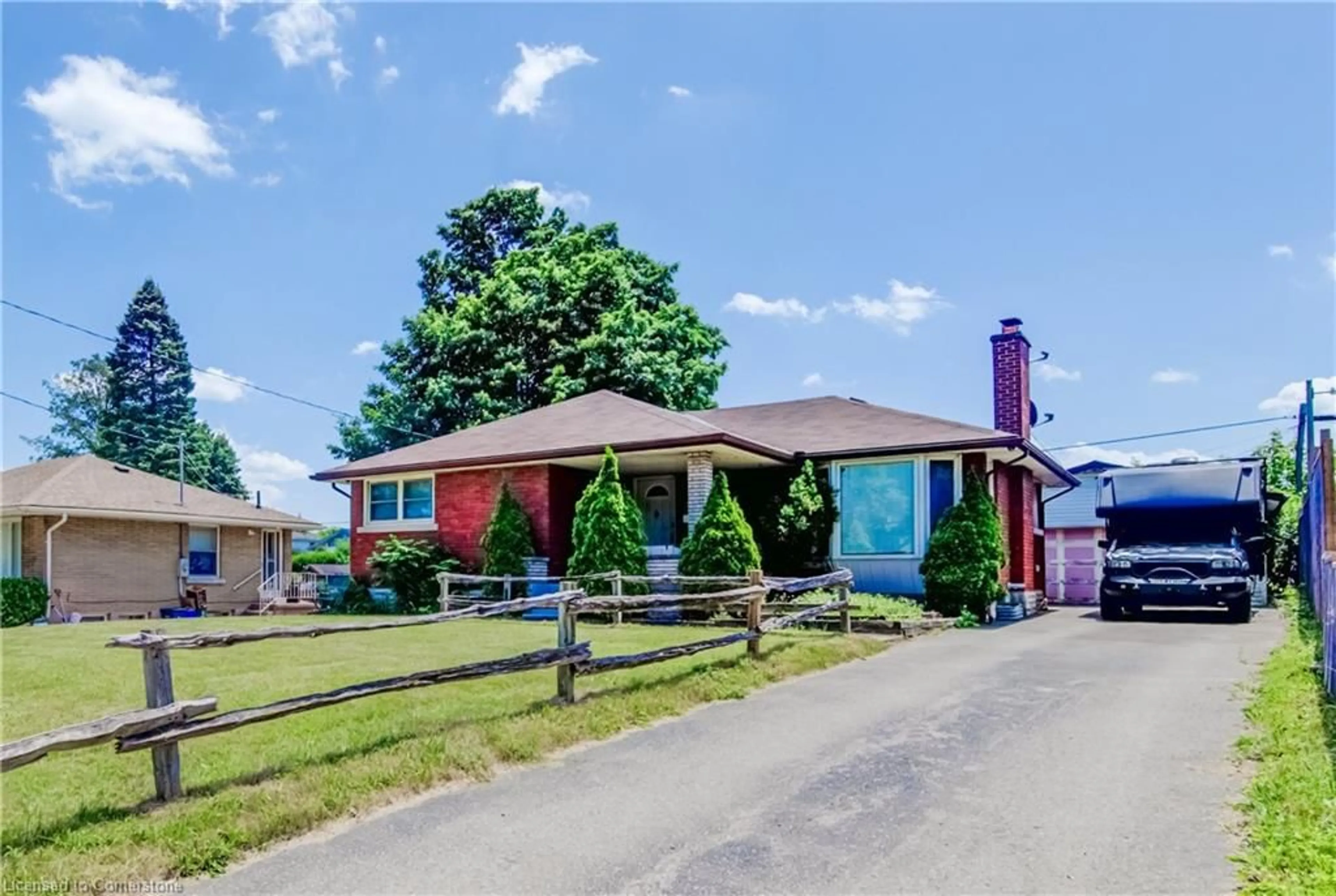 Home with brick exterior material, street for 141 Woodhaven Rd, Kitchener Ontario N2C 1V2