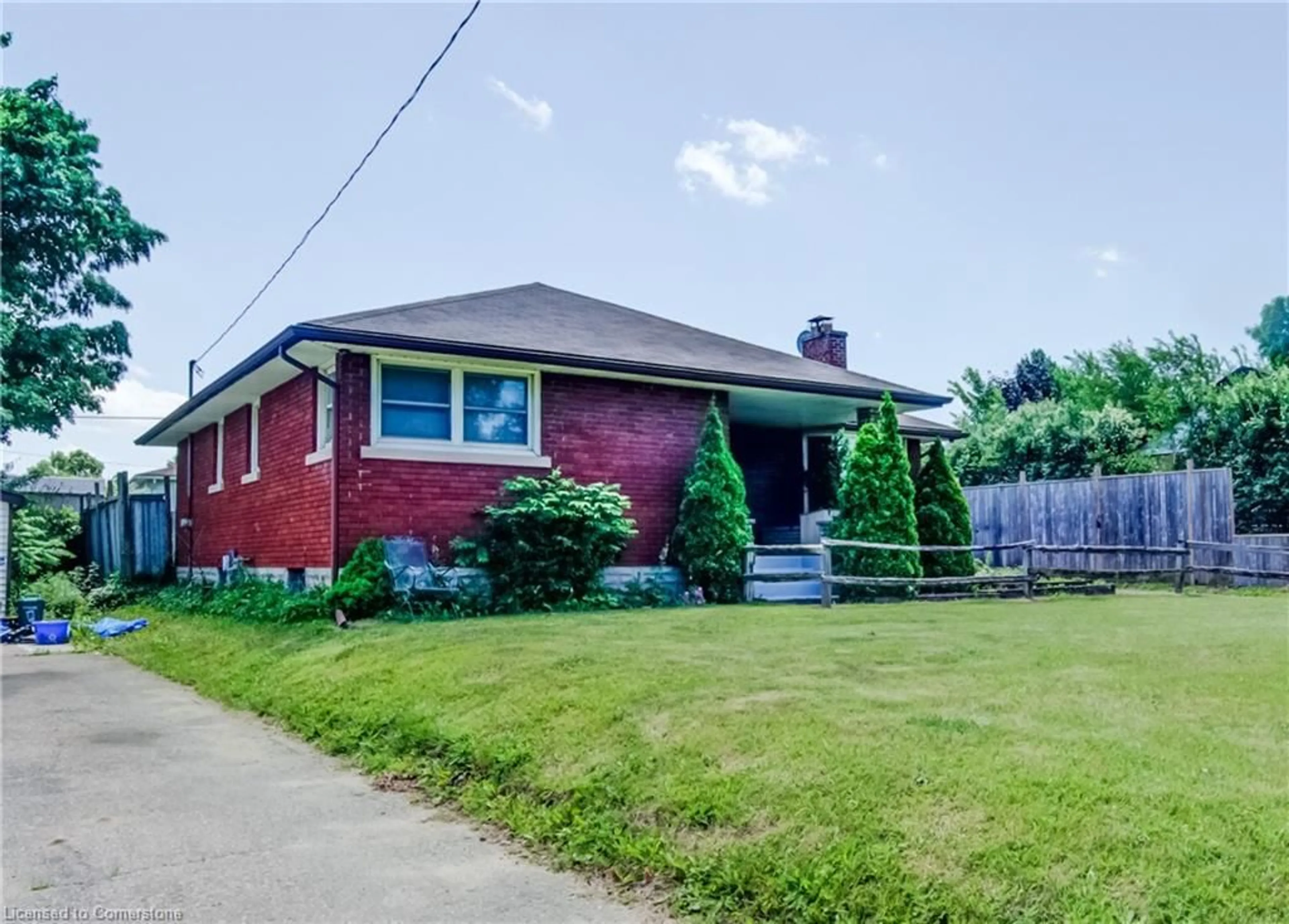 Home with brick exterior material, street for 141 Woodhaven Rd, Kitchener Ontario N2C 1V2