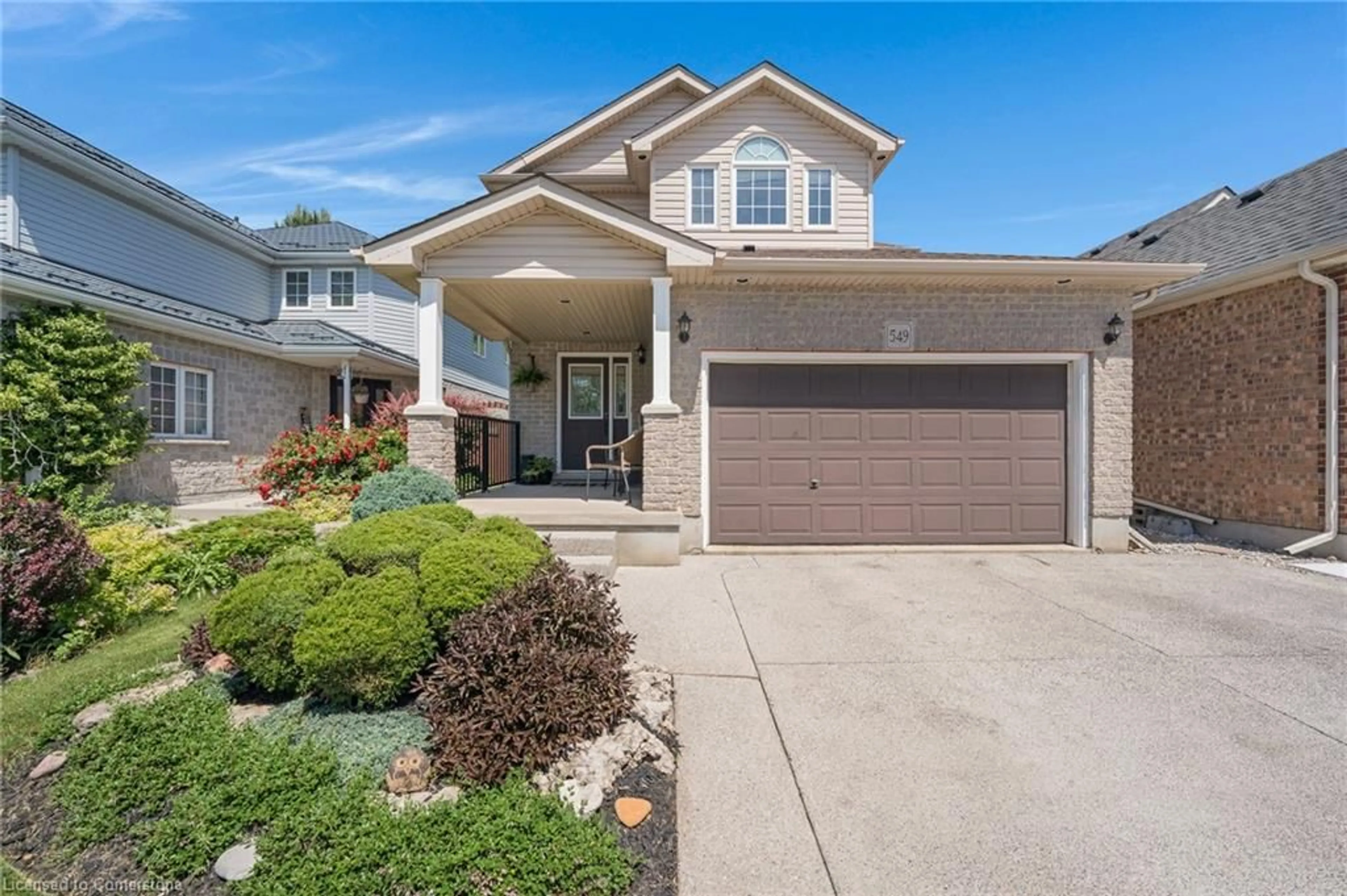 Home with vinyl exterior material, street for 549 Langlaw Dr, Cambridge Ontario N1P 1H8