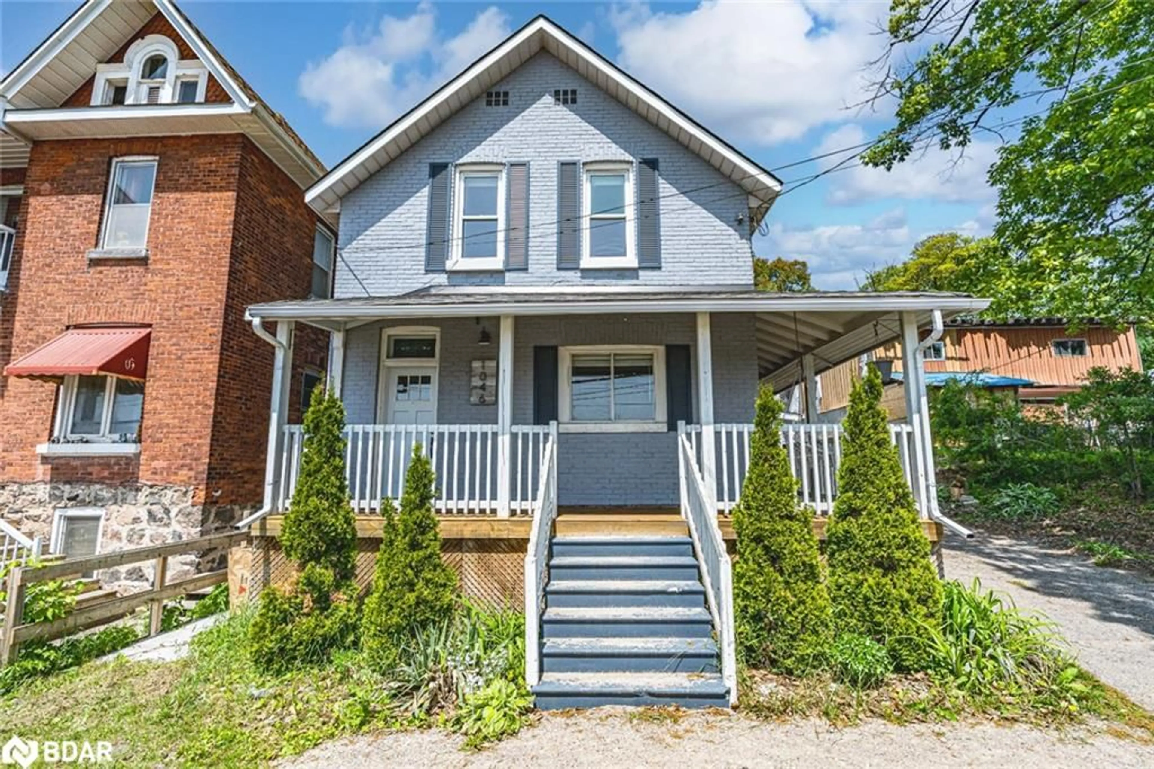 Home with brick exterior material, street for 1046 Harbourview Dr, Midland Ontario L4R 5J4