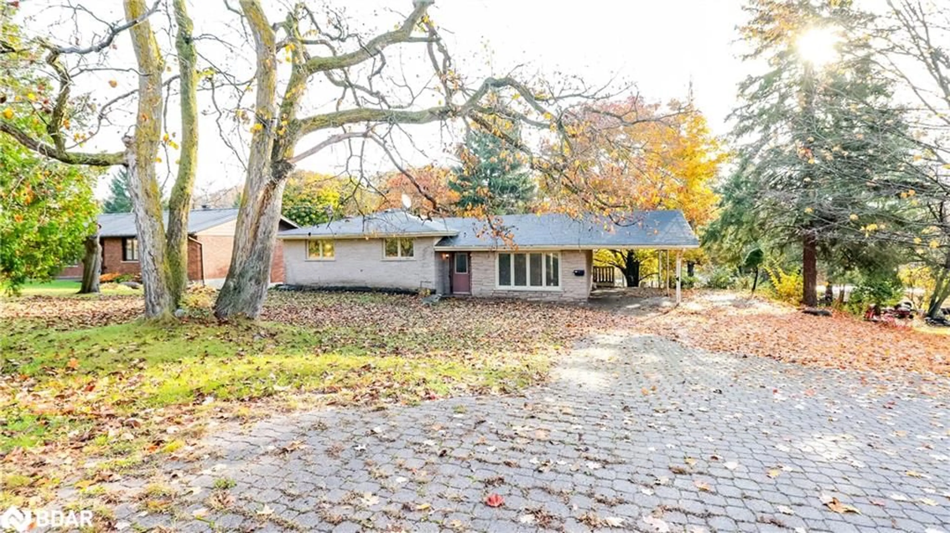 Home with brick exterior material, street for 18 Kennedy Dr, Fenelon Falls Ontario K0M 1N0