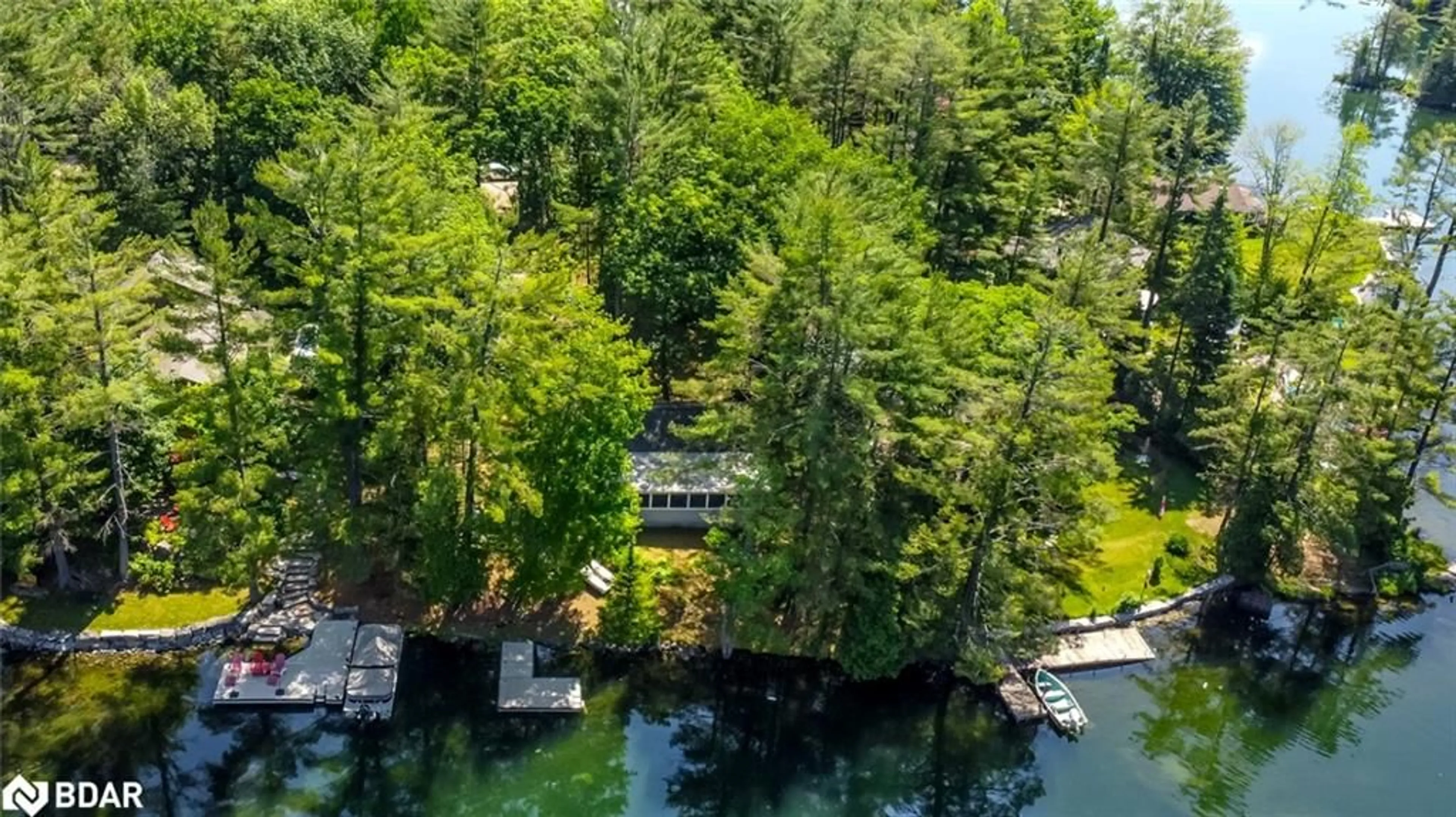 A pic from outside/outdoor area/front of a property/back of a property/a pic from drone, water/lake/river/ocean view for 3587 Riverdale Drive, Washago Ontario L0K 2B0