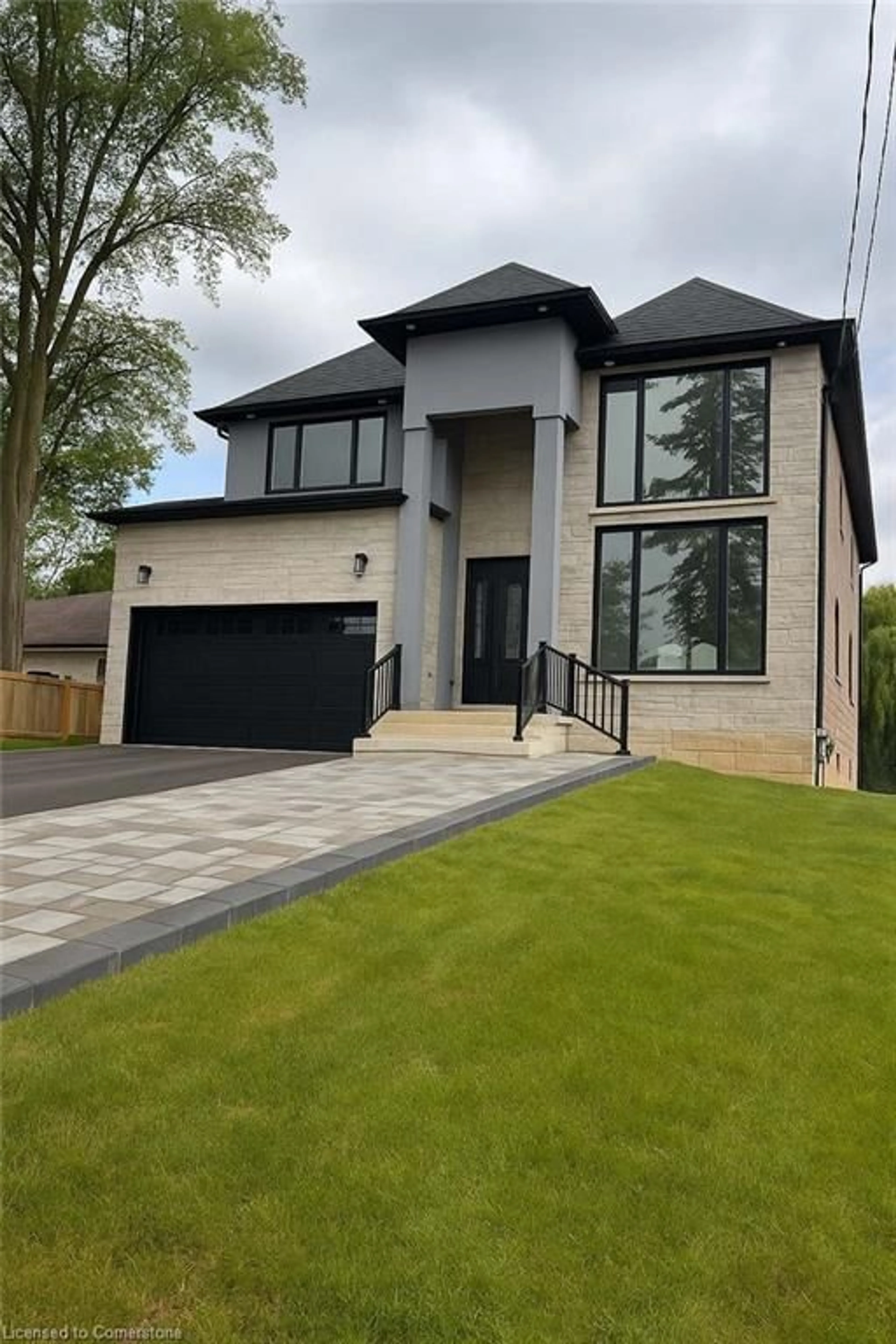 Home with brick exterior material, street for 653 Mohawk Rd, Ancaster Ontario L9G 2X1