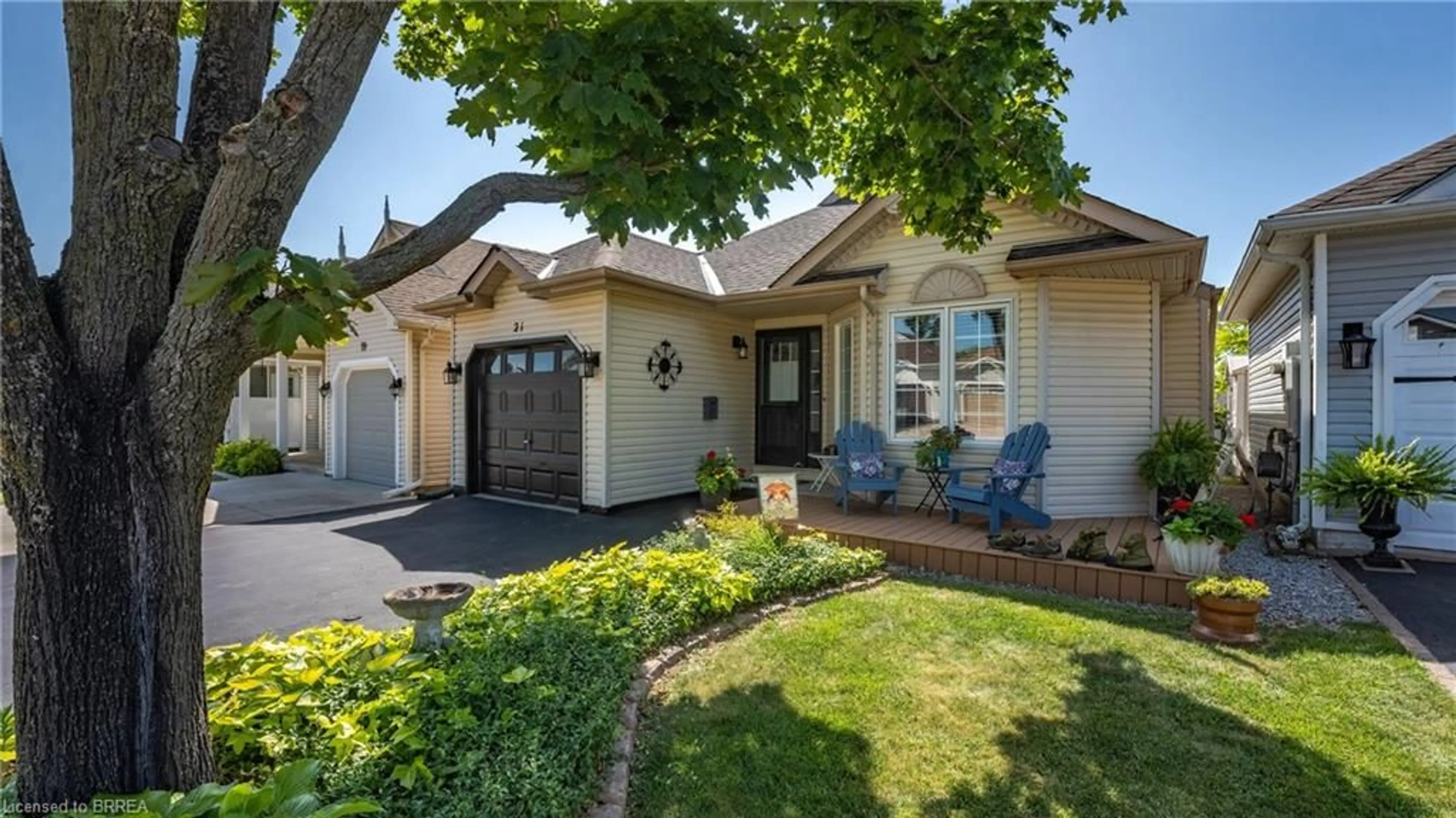 Home with vinyl exterior material, street for 21 Long Point Blvd, Port Rowan Ontario N0E 1M0