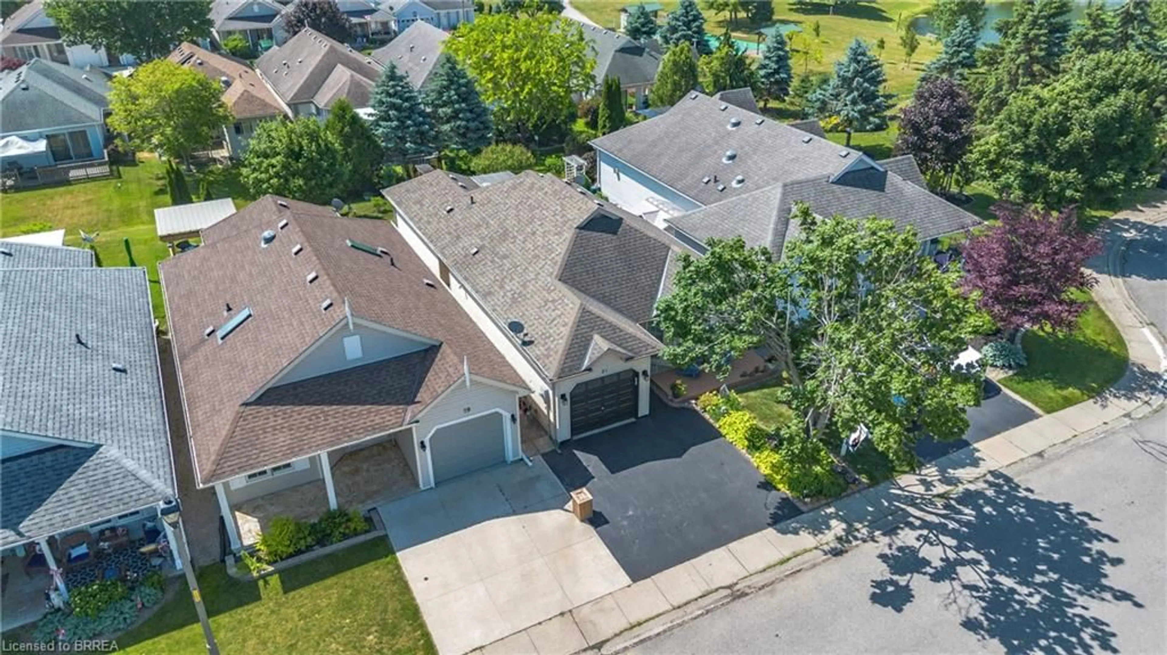 A pic from outside/outdoor area/front of a property/back of a property/a pic from drone, street for 21 Long Point Blvd, Port Rowan Ontario N0E 1M0