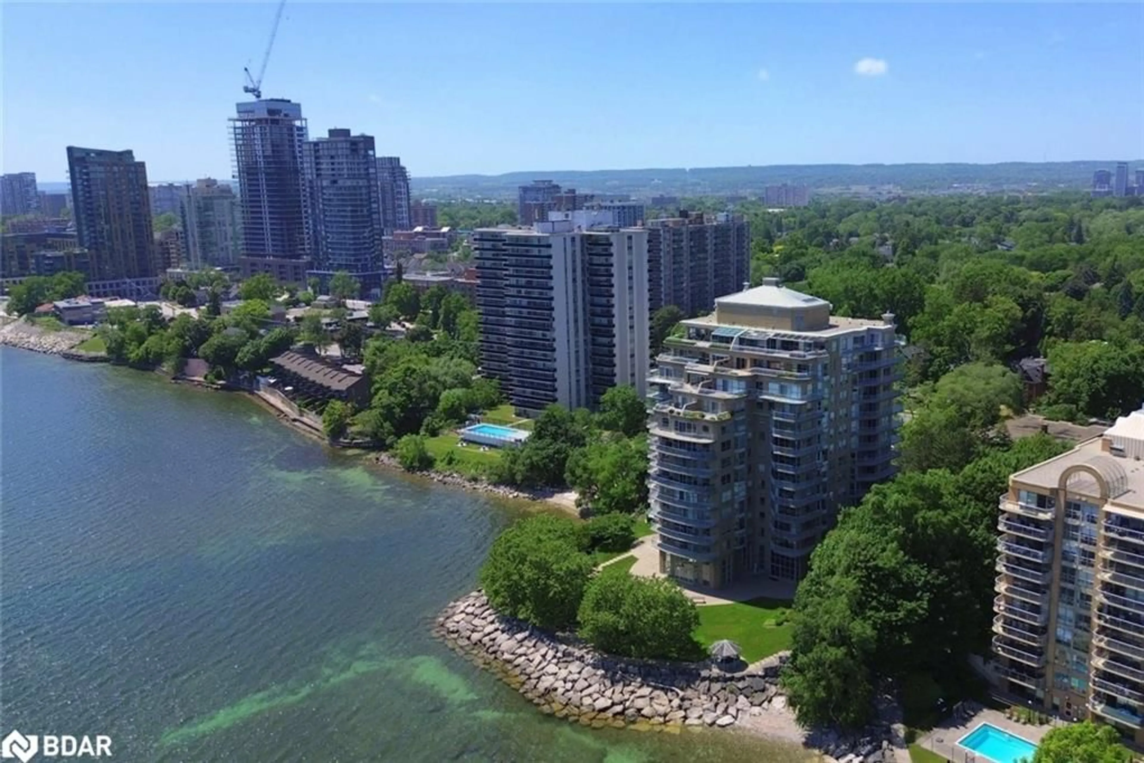A pic from outside/outdoor area/front of a property/back of a property/a pic from drone, water/lake/river/ocean view for 2190 Lakeshore Rd #204, Burlington Ontario L7R 4K1