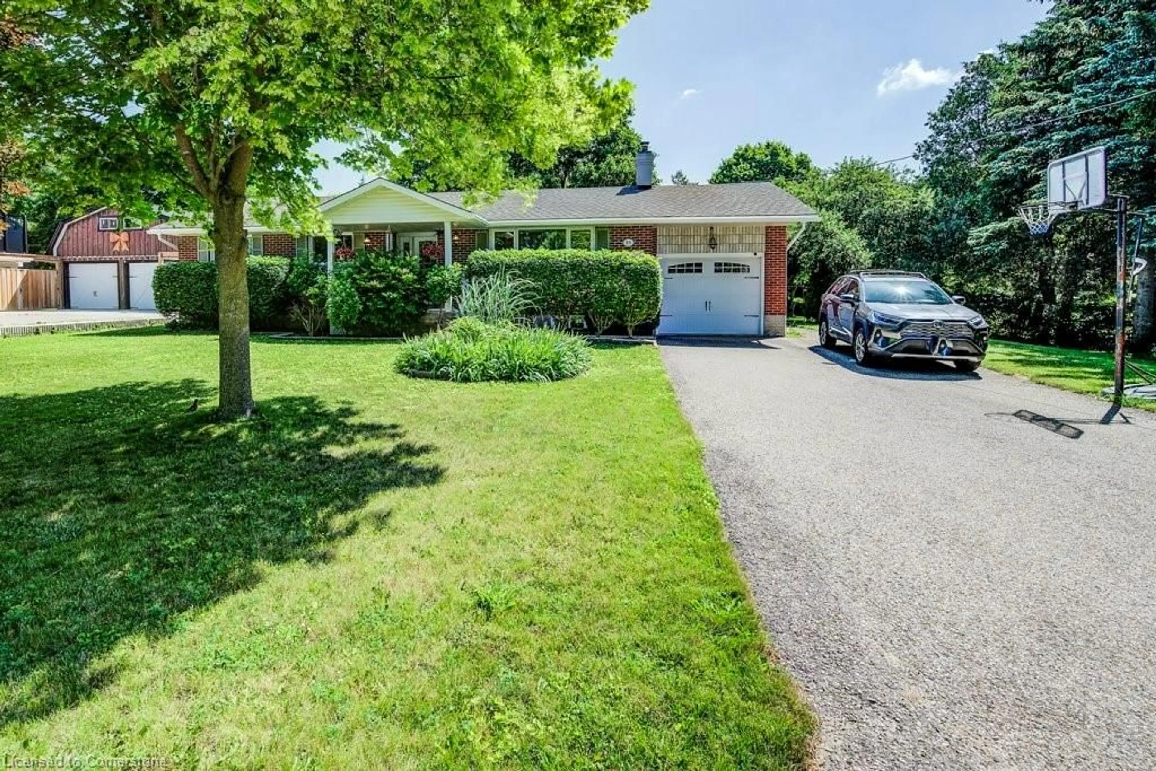 A pic from outside/outdoor area/front of a property/back of a property/a pic from drone, street for 18 Marshall Ave, North Dumfries Ontario N0B 1E0